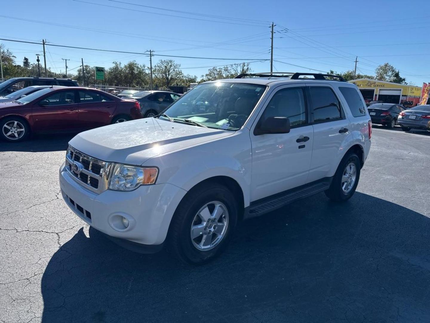 2011 WHITE FORD ESCAPE XLT (1FMCU0D74BK) with an 2.5L engine, Automatic transmission, located at 2929 9th St. West, Bradenton, 34205, (941) 242-2810, 27.473591, -82.570679 - Thanks for inquring into DriveNation USA! All vehicles listed can be viewed at www.drivenationusa.com for vehicle history reports and additonal info. We cannot quote any terms such as down payments or monthly payments without an application. You can apply directly at www.drivenationusa.com or by con - Photo#4