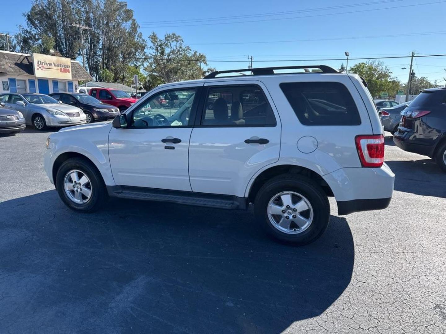 2011 WHITE FORD ESCAPE XLT (1FMCU0D74BK) with an 2.5L engine, Automatic transmission, located at 2929 9th St. West, Bradenton, 34205, (941) 242-2810, 27.473591, -82.570679 - Thanks for inquring into DriveNation USA! All vehicles listed can be viewed at www.drivenationusa.com for vehicle history reports and additonal info. We cannot quote any terms such as down payments or monthly payments without an application. You can apply directly at www.drivenationusa.com or by con - Photo#5