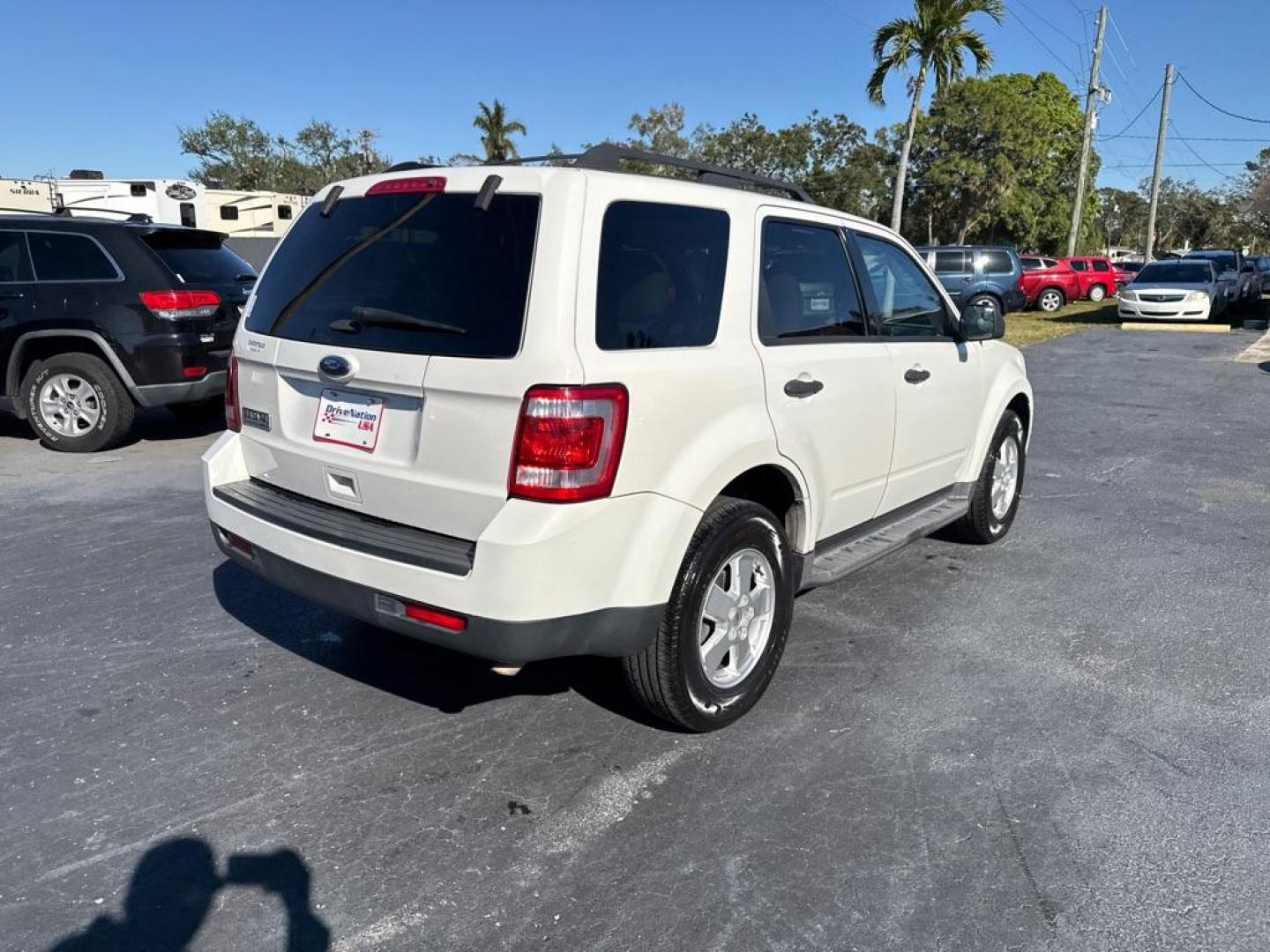 2011 WHITE FORD ESCAPE XLT (1FMCU0D74BK) with an 2.5L engine, Automatic transmission, located at 2929 9th St. West, Bradenton, 34205, (941) 242-2810, 27.473591, -82.570679 - Thanks for inquring into DriveNation USA! All vehicles listed can be viewed at www.drivenationusa.com for vehicle history reports and additonal info. We cannot quote any terms such as down payments or monthly payments without an application. You can apply directly at www.drivenationusa.com or by con - Photo#7