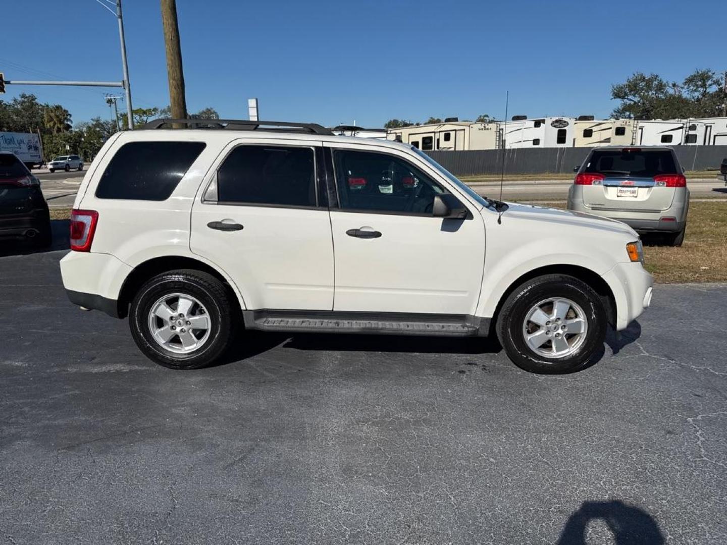 2011 WHITE FORD ESCAPE XLT (1FMCU0D74BK) with an 2.5L engine, Automatic transmission, located at 2929 9th St. West, Bradenton, 34205, (941) 242-2810, 27.473591, -82.570679 - Thanks for inquring into DriveNation USA! All vehicles listed can be viewed at www.drivenationusa.com for vehicle history reports and additonal info. We cannot quote any terms such as down payments or monthly payments without an application. You can apply directly at www.drivenationusa.com or by con - Photo#8