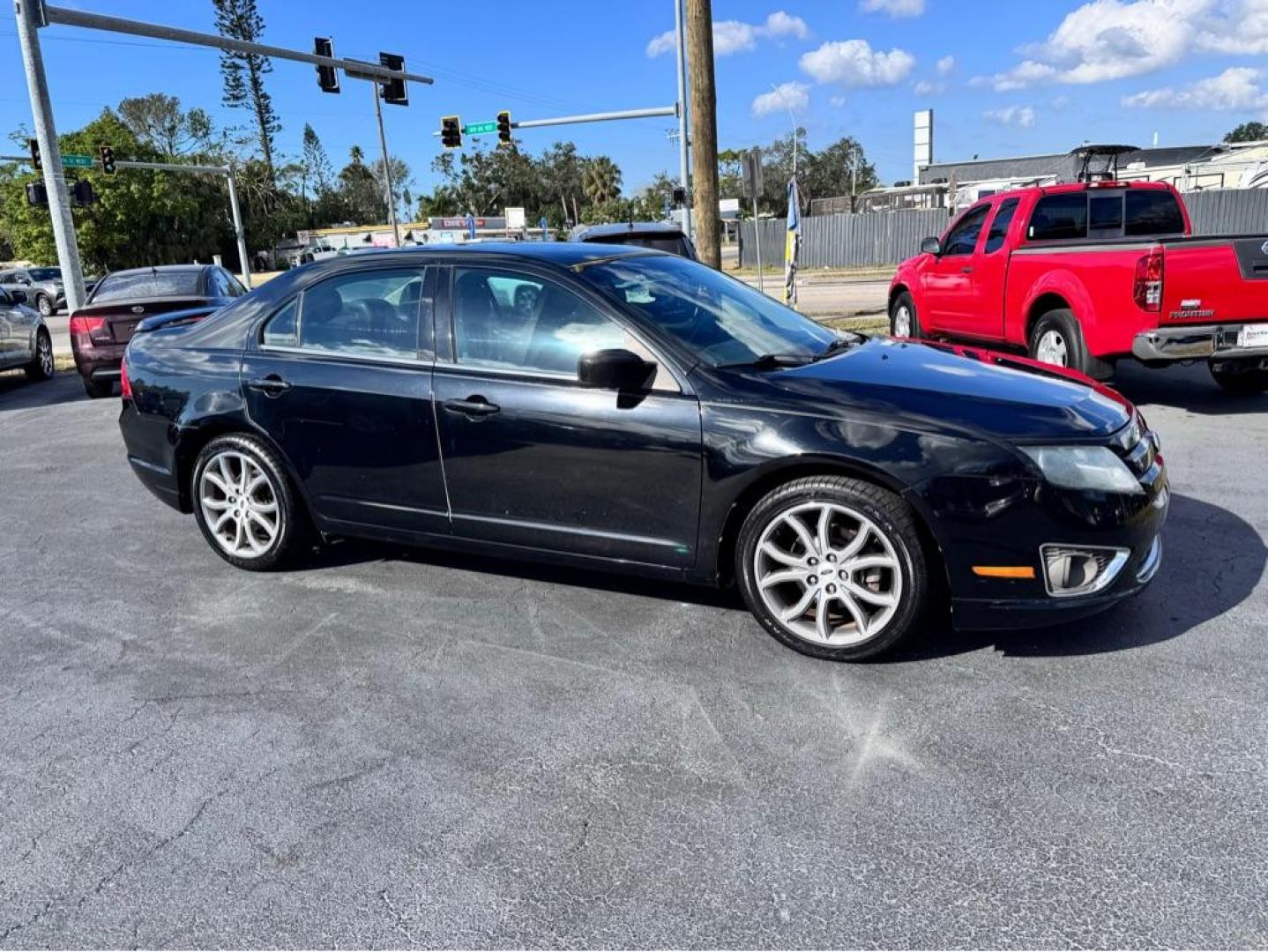 2012 BLACK FORD FUSION SEL (3FAHP0JA5CR) with an 2.5L engine, Automatic transmission, located at 2929 9th St. West, Bradenton, 34205, (941) 242-2810, 27.473591, -82.570679 - Thanks for inquring into DriveNation USA! All vehicles listed can be viewed at www.drivenationusa.com for vehicle history reports and additonal info. We cannot quote any terms such as down payments or monthly payments without an application. You can apply directly at www.drivenationusa.com or by con - Photo#0