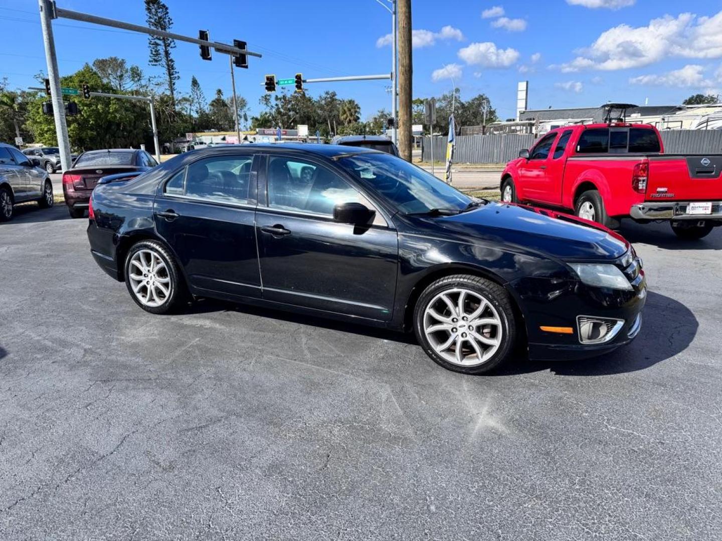 2012 BLACK FORD FUSION SEL (3FAHP0JA5CR) with an 2.5L engine, Automatic transmission, located at 2929 9th St. West, Bradenton, 34205, (941) 242-2810, 27.473591, -82.570679 - Thanks for inquring into DriveNation USA! All vehicles listed can be viewed at www.drivenationusa.com for vehicle history reports and additonal info. We cannot quote any terms such as down payments or monthly payments without an application. You can apply directly at www.drivenationusa.com or by con - Photo#1