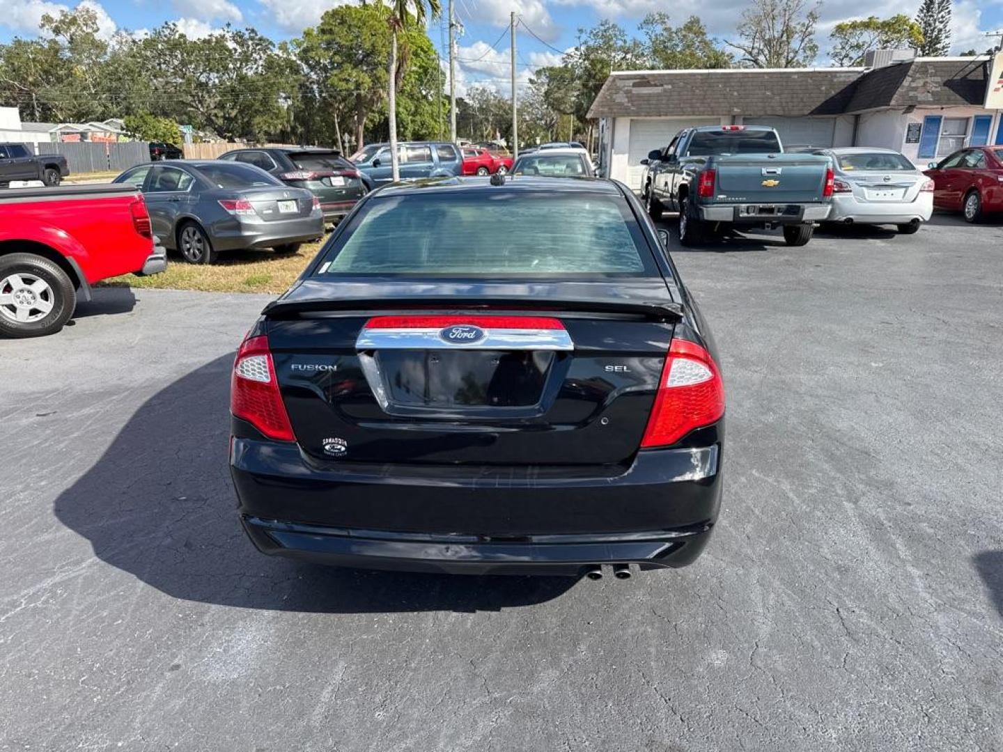 2012 BLACK FORD FUSION SEL (3FAHP0JA5CR) with an 2.5L engine, Automatic transmission, located at 2929 9th St. West, Bradenton, 34205, (941) 242-2810, 27.473591, -82.570679 - Thanks for inquring into DriveNation USA! All vehicles listed can be viewed at www.drivenationusa.com for vehicle history reports and additonal info. We cannot quote any terms such as down payments or monthly payments without an application. You can apply directly at www.drivenationusa.com or by con - Photo#6