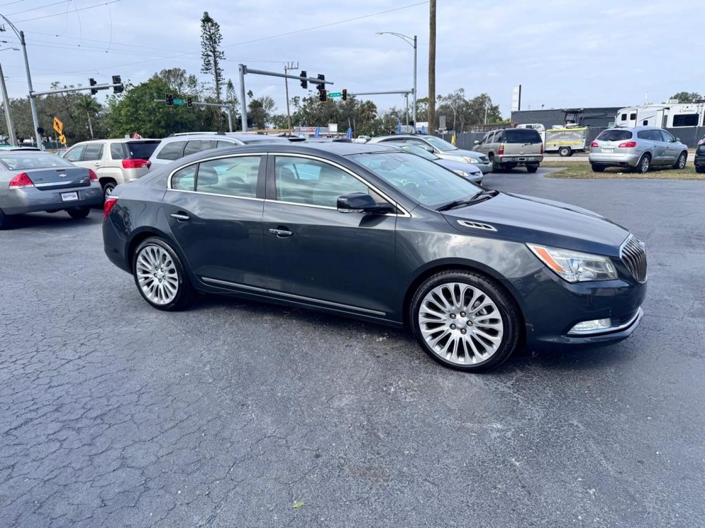 2014 BLACK BUICK LACROSSE TOURING (1G4GF5G34EF) with an 3.6L engine, Automatic transmission, located at 2929 9th St. West, Bradenton, 34205, (941) 242-2810, 27.473591, -82.570679 - Photo#0