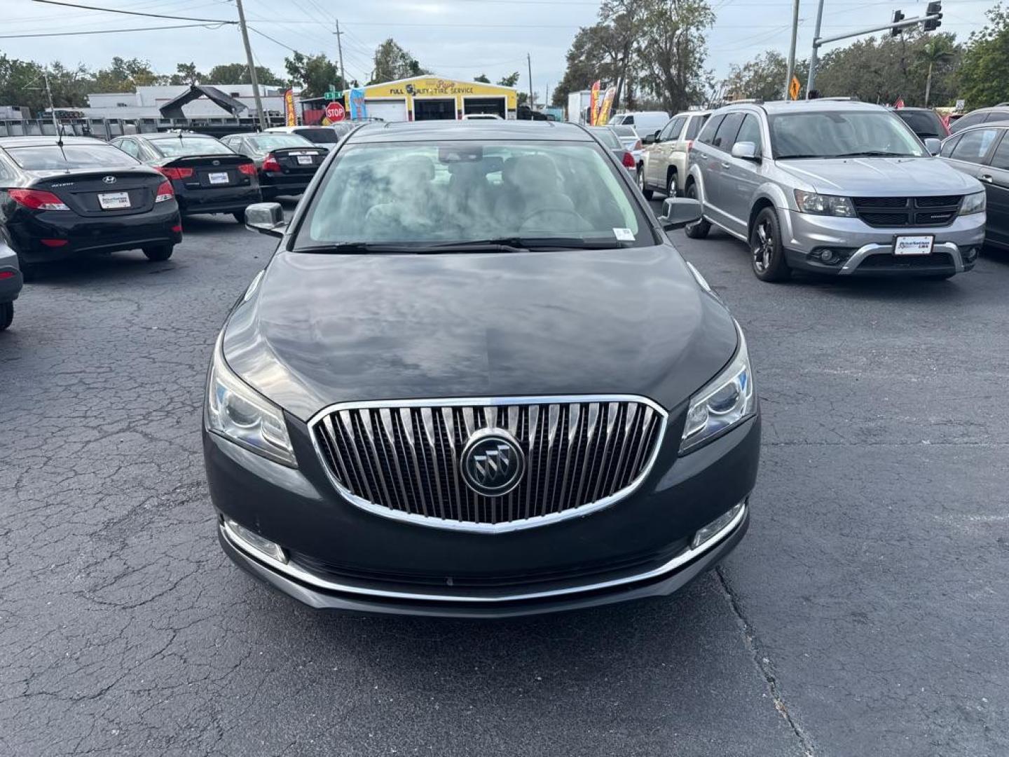 2014 BLACK BUICK LACROSSE TOURING (1G4GF5G34EF) with an 3.6L engine, Automatic transmission, located at 2929 9th St. West, Bradenton, 34205, (941) 242-2810, 27.473591, -82.570679 - Photo#1