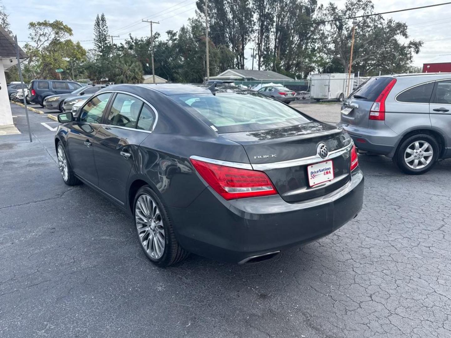 2014 BLACK BUICK LACROSSE TOURING (1G4GF5G34EF) with an 3.6L engine, Automatic transmission, located at 2929 9th St. West, Bradenton, 34205, (941) 242-2810, 27.473591, -82.570679 - Photo#5