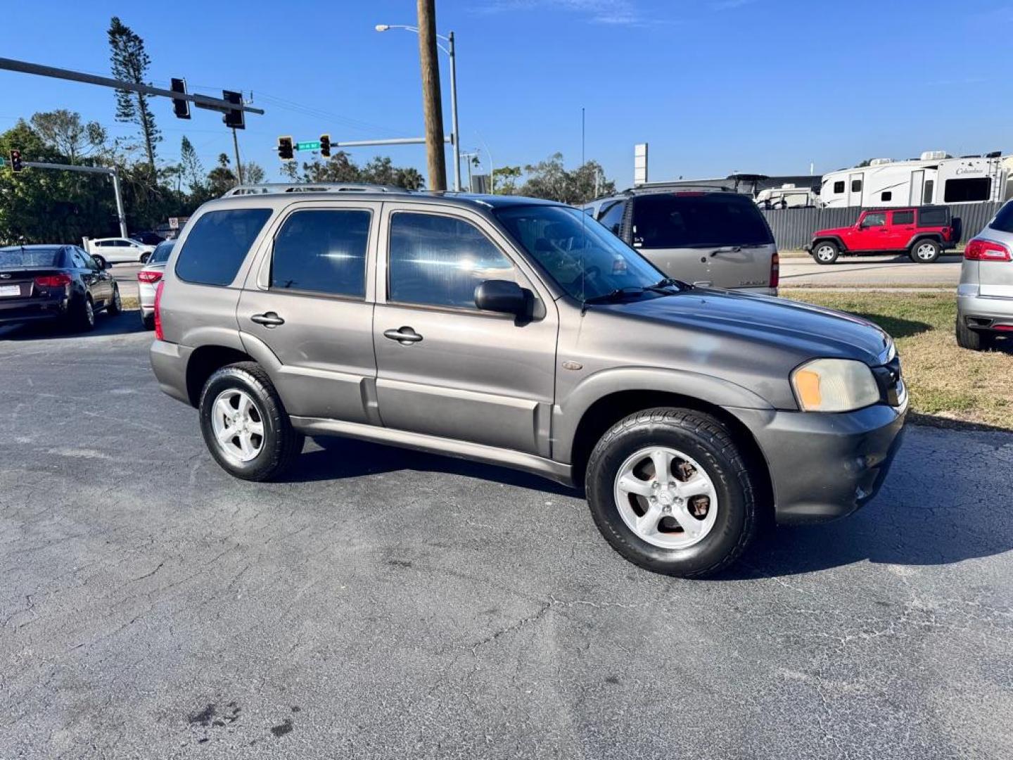 2006 GRAY MAZDA TRIBUTE S (4F2YZ04106K) with an 3.0L engine, Automatic transmission, located at 2929 9th St. West, Bradenton, 34205, (941) 242-2810, 27.473591, -82.570679 - Thanks for inquring into DriveNation USA! All vehicles listed can be viewed at www.drivenationusa.com for vehicle history reports and additonal info. We cannot quote any terms such as down payments or monthly payments without an application. You can apply directly at www.drivenationusa.com or by con - Photo#1