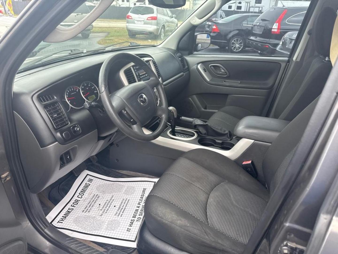 2006 GRAY MAZDA TRIBUTE S (4F2YZ04106K) with an 3.0L engine, Automatic transmission, located at 2929 9th St. West, Bradenton, 34205, (941) 242-2810, 27.473591, -82.570679 - Thanks for inquring into DriveNation USA! All vehicles listed can be viewed at www.drivenationusa.com for vehicle history reports and additonal info. We cannot quote any terms such as down payments or monthly payments without an application. You can apply directly at www.drivenationusa.com or by con - Photo#9