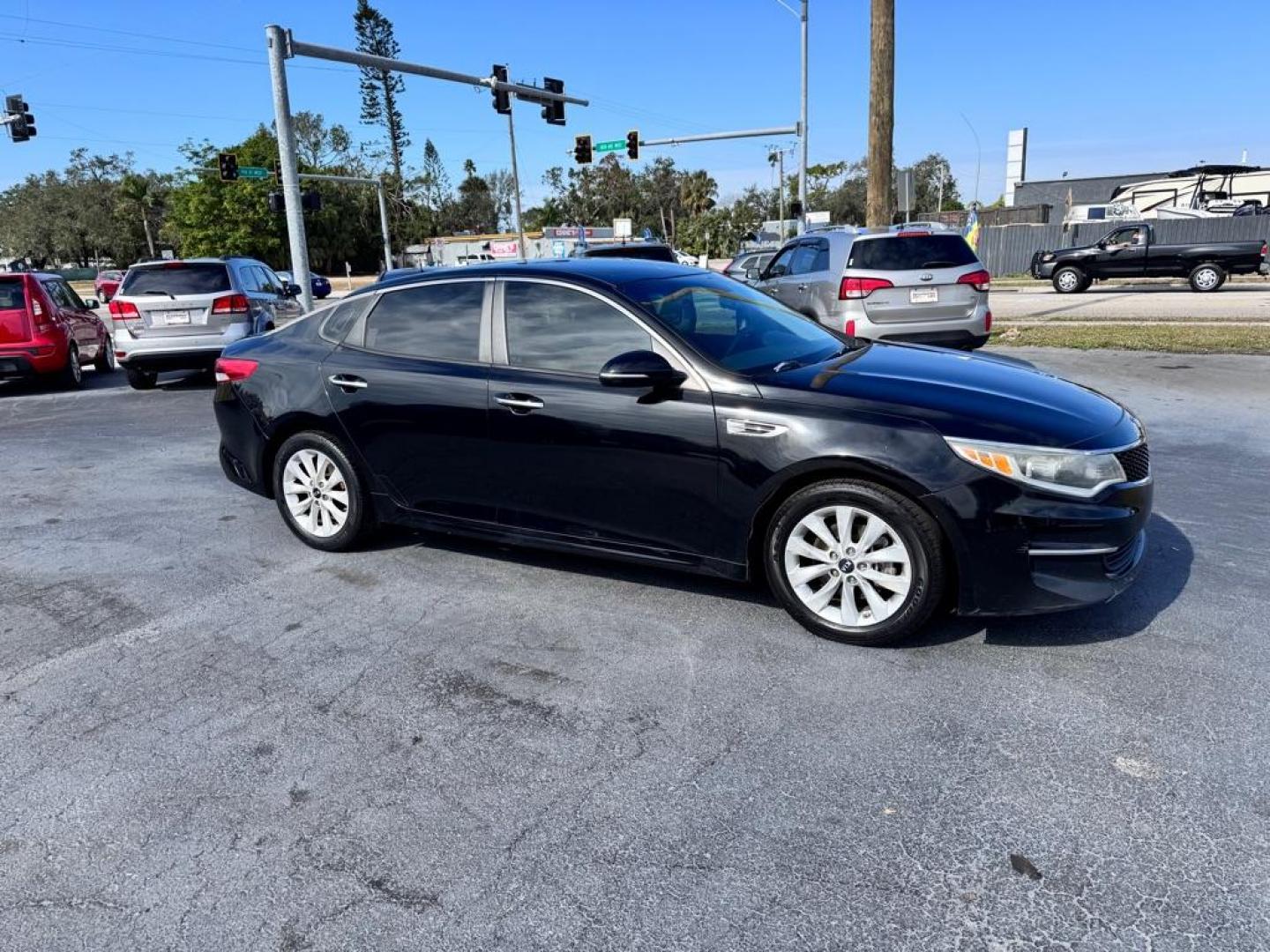 2016 BLACK KIA OPTIMA LX (5XXGT4L35GG) with an 2.4L engine, Automatic transmission, located at 2929 9th St. West, Bradenton, 34205, (941) 242-2810, 27.473591, -82.570679 - Thanks for inquring into DriveNation USA! All vehicles listed can be viewed at www.drivenationusa.com for vehicle history reports and additonal info. We cannot quote any terms such as down payments or monthly payments without an application. You can apply directly at www.drivenationusa.com or by con - Photo#0