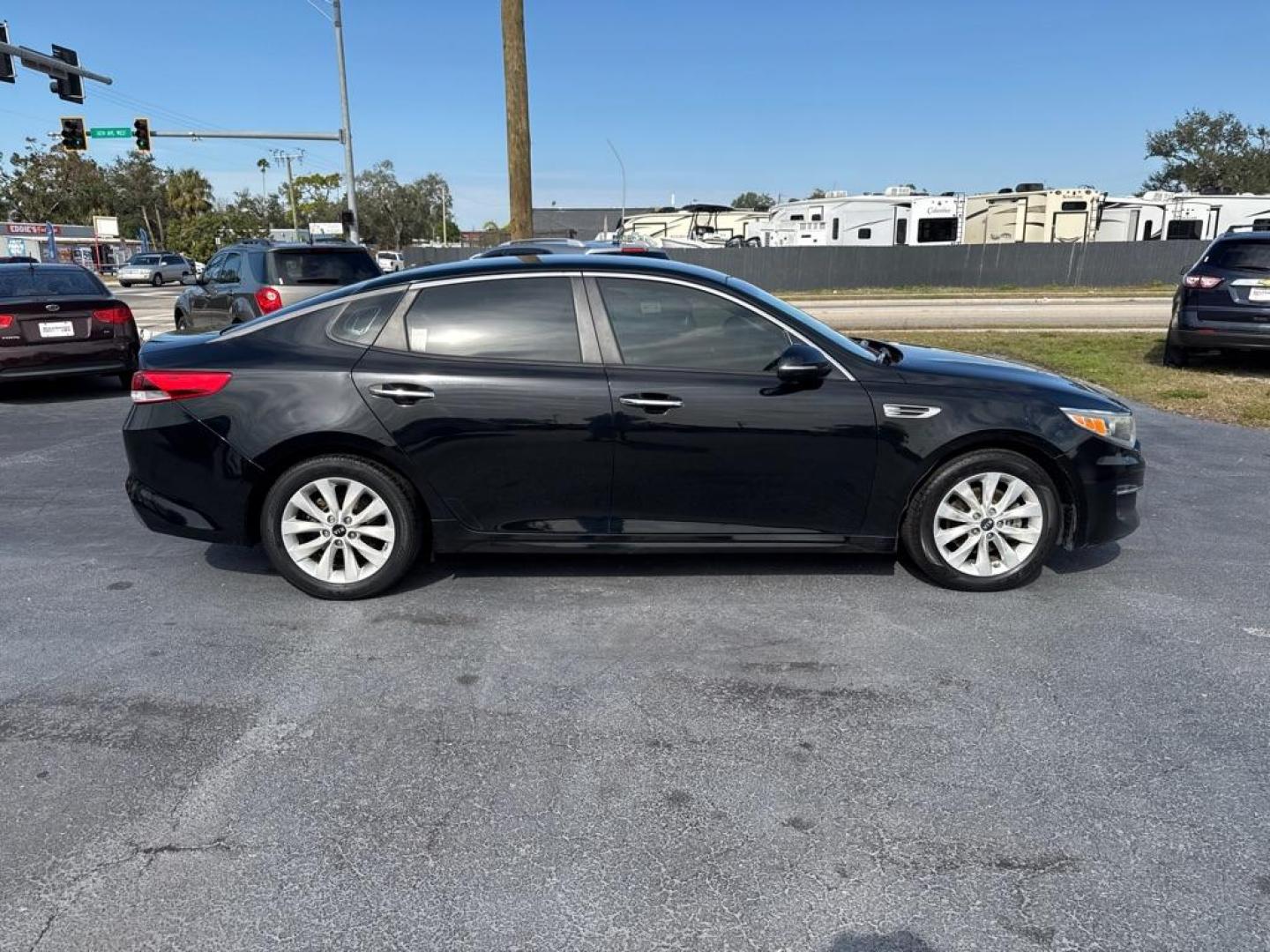 2016 BLACK KIA OPTIMA LX (5XXGT4L35GG) with an 2.4L engine, Automatic transmission, located at 2929 9th St. West, Bradenton, 34205, (941) 242-2810, 27.473591, -82.570679 - Thanks for inquring into DriveNation USA! All vehicles listed can be viewed at www.drivenationusa.com for vehicle history reports and additonal info. We cannot quote any terms such as down payments or monthly payments without an application. You can apply directly at www.drivenationusa.com or by con - Photo#9