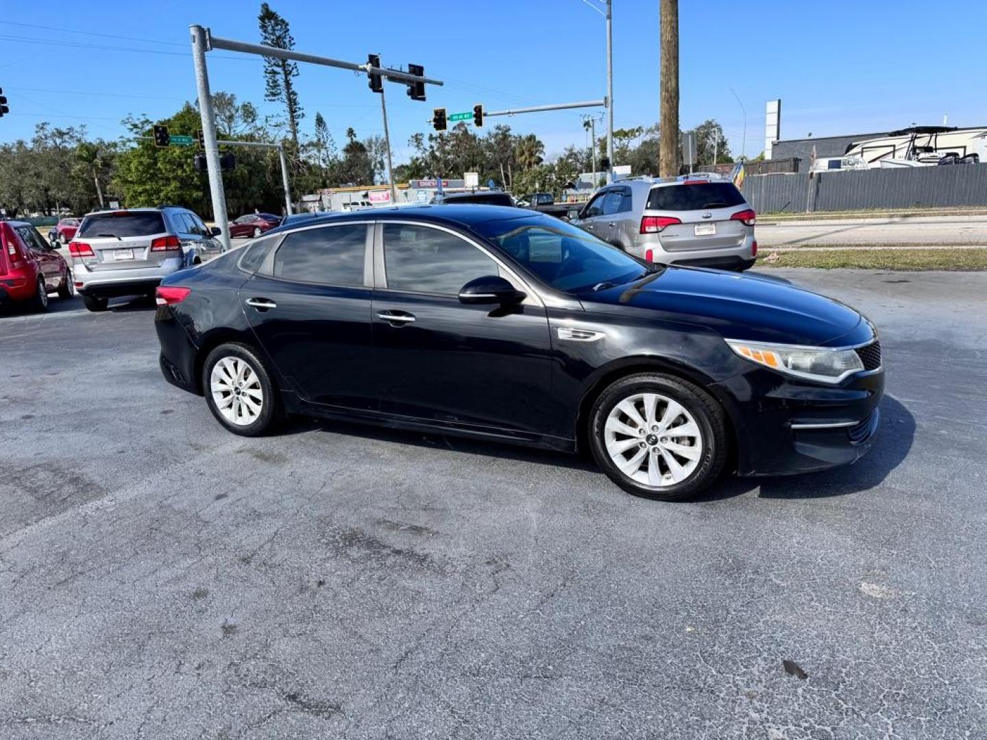 2016 BLACK KIA OPTIMA LX (5XXGT4L35GG) with an 2.4L engine, Automatic transmission, located at 2929 9th St. West, Bradenton, 34205, (941) 242-2810, 27.473591, -82.570679 - Thanks for inquring into DriveNation USA! All vehicles listed can be viewed at www.drivenationusa.com for vehicle history reports and additonal info. We cannot quote any terms such as down payments or monthly payments without an application. You can apply directly at www.drivenationusa.com or by con - Photo#1