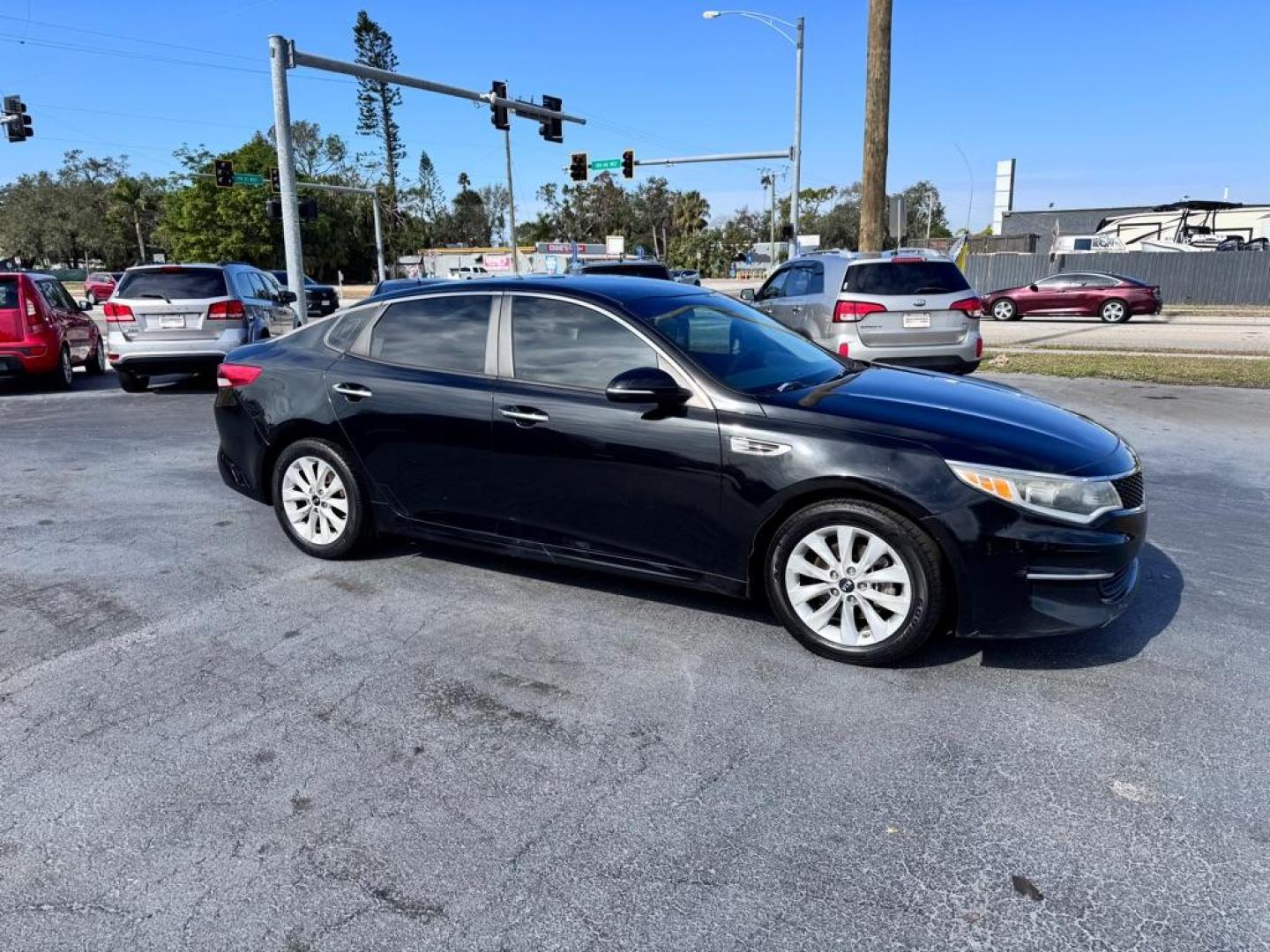 2016 BLACK KIA OPTIMA LX (5XXGT4L35GG) with an 2.4L engine, Automatic transmission, located at 2929 9th St. West, Bradenton, 34205, (941) 242-2810, 27.473591, -82.570679 - Thanks for inquring into DriveNation USA! All vehicles listed can be viewed at www.drivenationusa.com for vehicle history reports and additonal info. We cannot quote any terms such as down payments or monthly payments without an application. You can apply directly at www.drivenationusa.com or by con - Photo#2