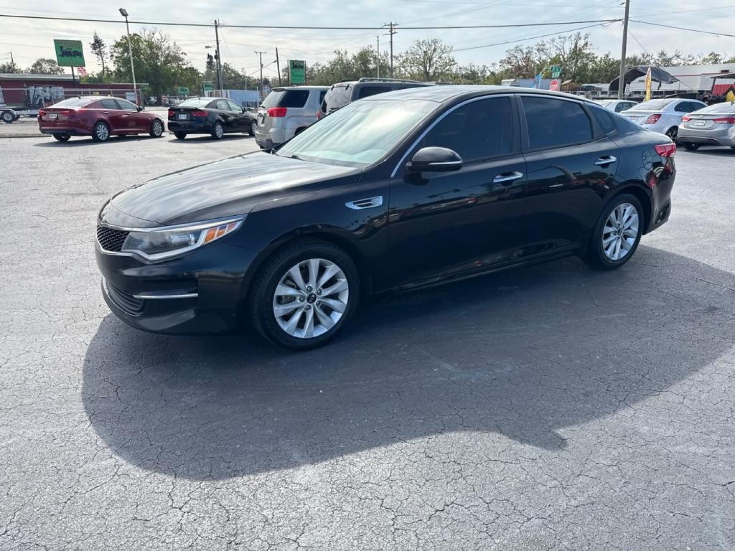 2016 BLACK KIA OPTIMA LX (5XXGT4L35GG) with an 2.4L engine, Automatic transmission, located at 2929 9th St. West, Bradenton, 34205, (941) 242-2810, 27.473591, -82.570679 - Thanks for inquring into DriveNation USA! All vehicles listed can be viewed at www.drivenationusa.com for vehicle history reports and additonal info. We cannot quote any terms such as down payments or monthly payments without an application. You can apply directly at www.drivenationusa.com or by con - Photo#4