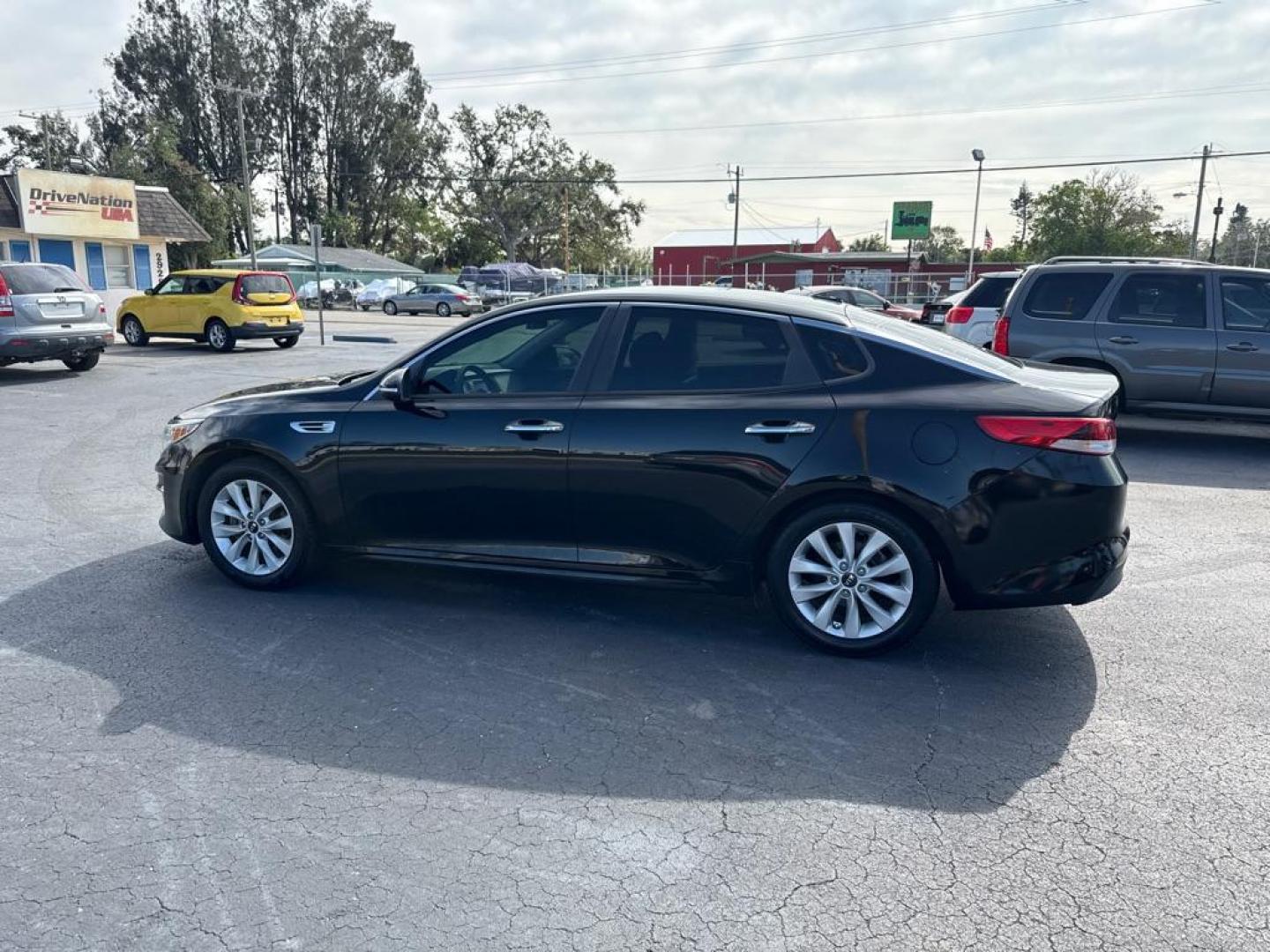 2016 BLACK KIA OPTIMA LX (5XXGT4L35GG) with an 2.4L engine, Automatic transmission, located at 2929 9th St. West, Bradenton, 34205, (941) 242-2810, 27.473591, -82.570679 - Thanks for inquring into DriveNation USA! All vehicles listed can be viewed at www.drivenationusa.com for vehicle history reports and additonal info. We cannot quote any terms such as down payments or monthly payments without an application. You can apply directly at www.drivenationusa.com or by con - Photo#5