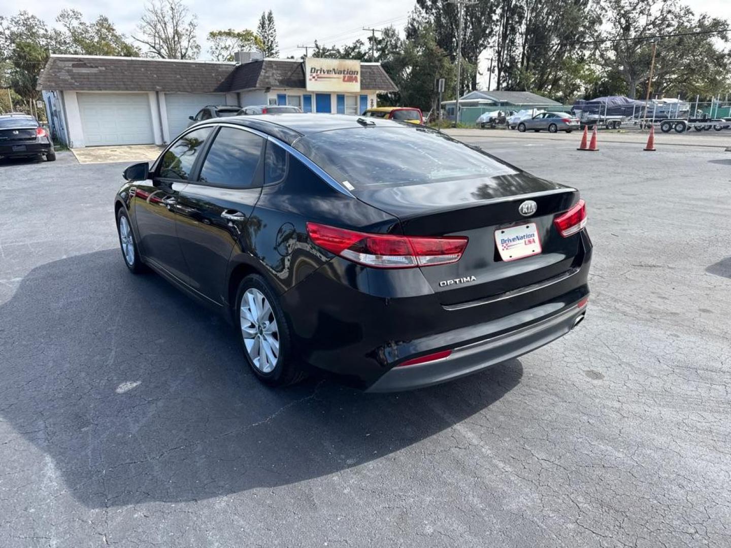 2016 BLACK KIA OPTIMA LX (5XXGT4L35GG) with an 2.4L engine, Automatic transmission, located at 2929 9th St. West, Bradenton, 34205, (941) 242-2810, 27.473591, -82.570679 - Thanks for inquring into DriveNation USA! All vehicles listed can be viewed at www.drivenationusa.com for vehicle history reports and additonal info. We cannot quote any terms such as down payments or monthly payments without an application. You can apply directly at www.drivenationusa.com or by con - Photo#6