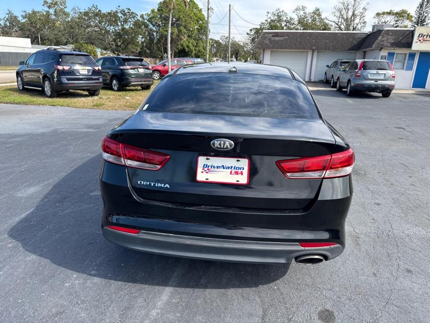 2016 BLACK KIA OPTIMA LX (5XXGT4L35GG) with an 2.4L engine, Automatic transmission, located at 2929 9th St. West, Bradenton, 34205, (941) 242-2810, 27.473591, -82.570679 - Thanks for inquring into DriveNation USA! All vehicles listed can be viewed at www.drivenationusa.com for vehicle history reports and additonal info. We cannot quote any terms such as down payments or monthly payments without an application. You can apply directly at www.drivenationusa.com or by con - Photo#7