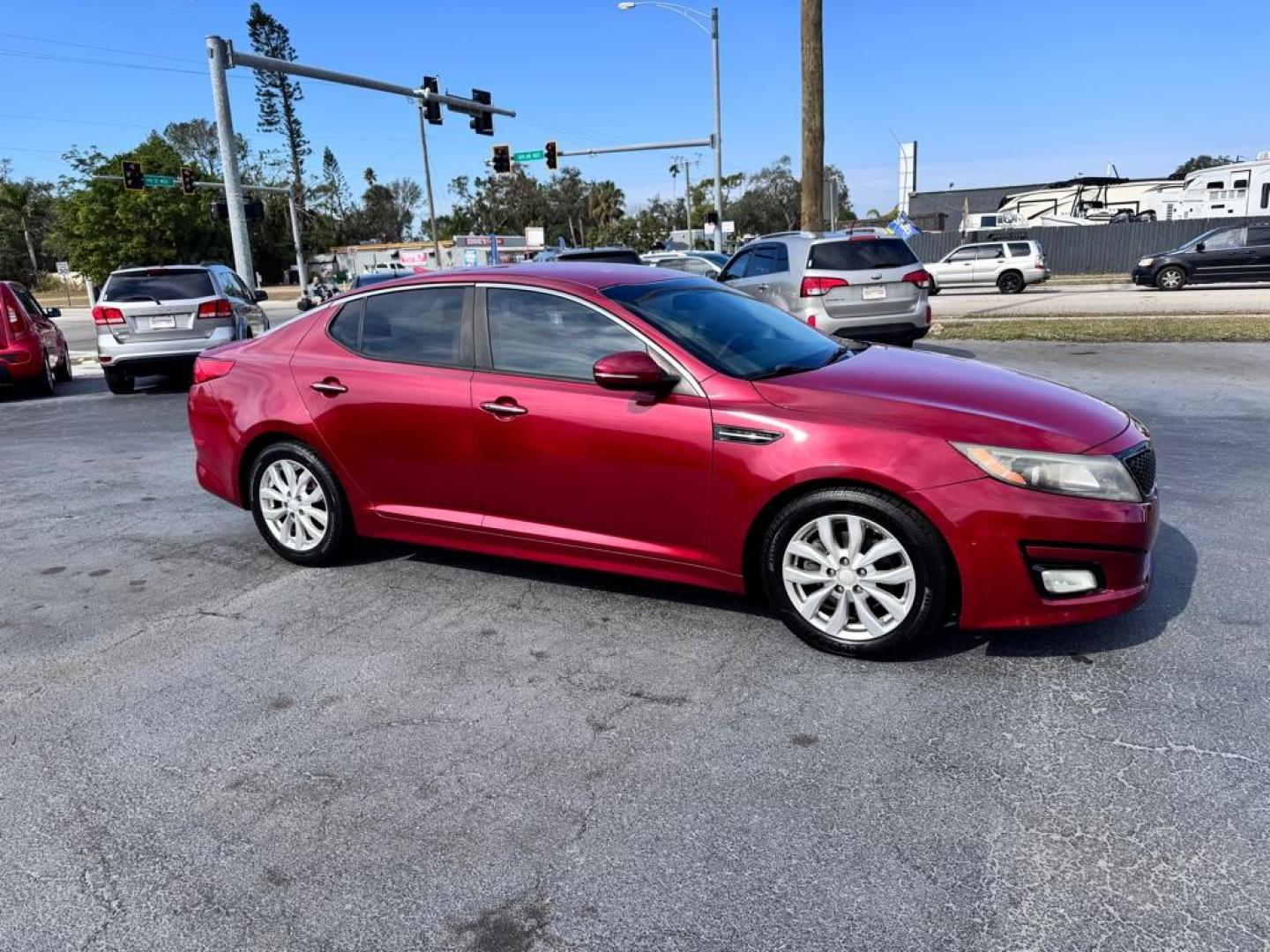 2015 RED KIA OPTIMA EX (5XXGN4A71FG) with an 2.4L engine, Automatic transmission, located at 2929 9th St. West, Bradenton, 34205, (941) 242-2810, 27.473591, -82.570679 - Thanks for inquring into DriveNation USA! All vehicles listed can be viewed at www.drivenationusa.com for vehicle history reports and additonal info. We cannot quote any terms such as down payments or monthly payments without an application. You can apply directly at www.drivenationusa.com or by con - Photo#1