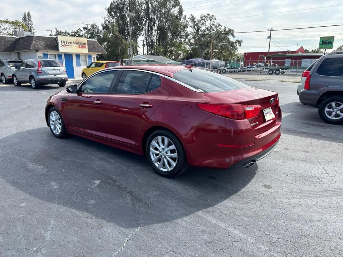 2015 RED KIA OPTIMA EX (5XXGN4A71FG) with an 2.4L engine, Automatic transmission, located at 2929 9th St. West, Bradenton, 34205, (941) 242-2810, 27.473591, -82.570679 - Thanks for inquring into DriveNation USA! All vehicles listed can be viewed at www.drivenationusa.com for vehicle history reports and additonal info. We cannot quote any terms such as down payments or monthly payments without an application. You can apply directly at www.drivenationusa.com or by con - Photo#6