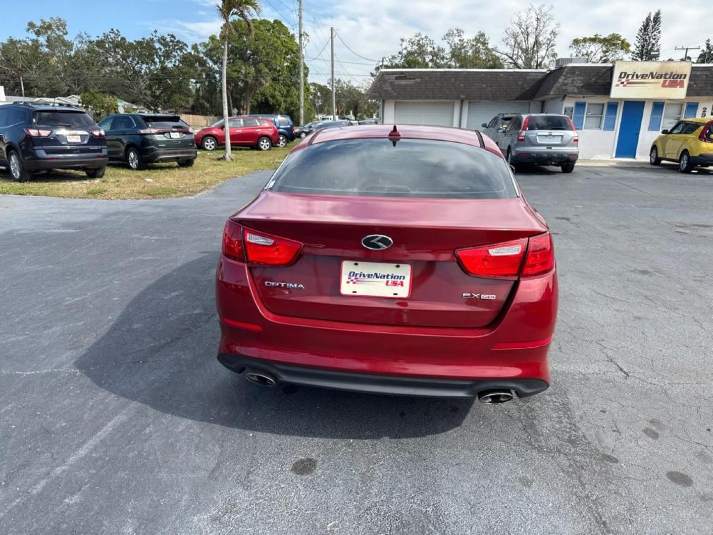 2015 RED KIA OPTIMA EX (5XXGN4A71FG) with an 2.4L engine, Automatic transmission, located at 2929 9th St. West, Bradenton, 34205, (941) 242-2810, 27.473591, -82.570679 - Thanks for inquring into DriveNation USA! All vehicles listed can be viewed at www.drivenationusa.com for vehicle history reports and additonal info. We cannot quote any terms such as down payments or monthly payments without an application. You can apply directly at www.drivenationusa.com or by con - Photo#7