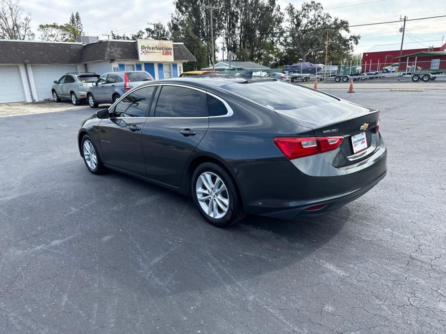 2018 GRAY CHEVROLET MALIBU LT (1G1ZD5ST4JF) with an 1.5L engine, Automatic transmission, located at 2929 9th St. West, Bradenton, 34205, (941) 242-2810, 27.473591, -82.570679 - Thanks for inquring into DriveNation USA! All vehicles listed can be viewed at www.drivenationusa.com for vehicle history reports and additonal info. We cannot quote any terms such as down payments or monthly payments without an application. You can apply directly at www.drivenationusa.com or by con - Photo#5