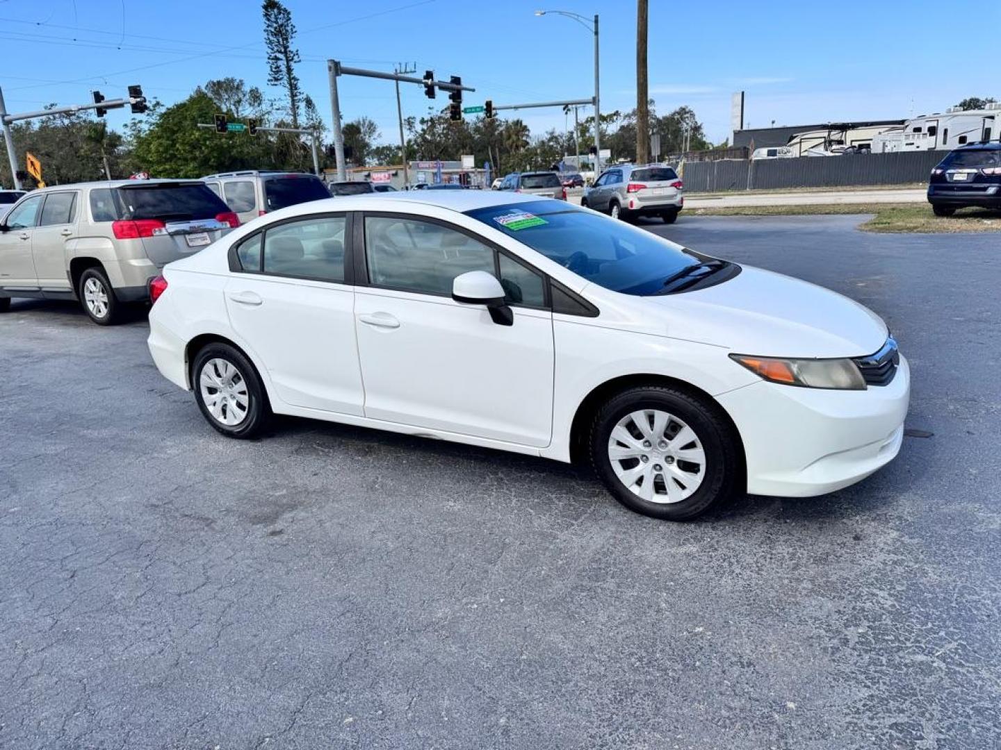 2012 WHITE HONDA CIVIC LX (19XFB2F58CE) with an 1.8L engine, Automatic transmission, located at 2929 9th St. West, Bradenton, 34205, (941) 242-2810, 27.473591, -82.570679 - Thanks for inquring into DriveNation USA! All vehicles listed can be viewed at www.drivenationusa.com for vehicle history reports and additonal info. We cannot quote any terms such as down payments or monthly payments without an application. You can apply directly at www.drivenationusa.com or by con - Photo#0