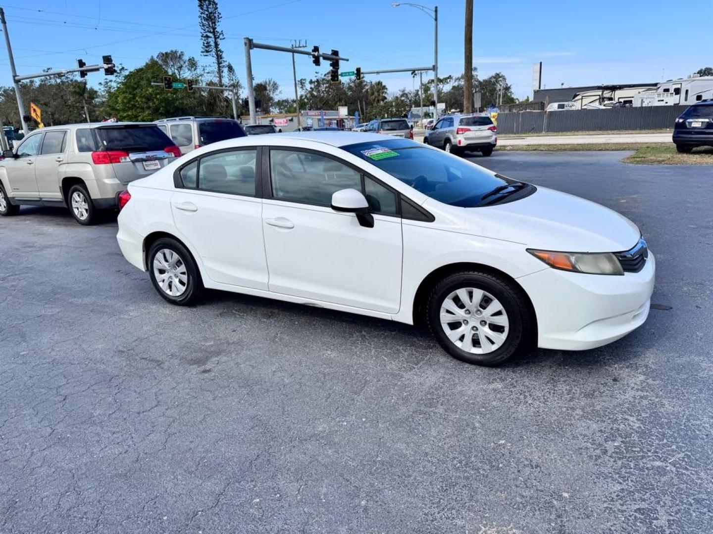 2012 WHITE HONDA CIVIC LX (19XFB2F58CE) with an 1.8L engine, Automatic transmission, located at 2929 9th St. West, Bradenton, 34205, (941) 242-2810, 27.473591, -82.570679 - Thanks for inquring into DriveNation USA! All vehicles listed can be viewed at www.drivenationusa.com for vehicle history reports and additonal info. We cannot quote any terms such as down payments or monthly payments without an application. You can apply directly at www.drivenationusa.com or by con - Photo#1