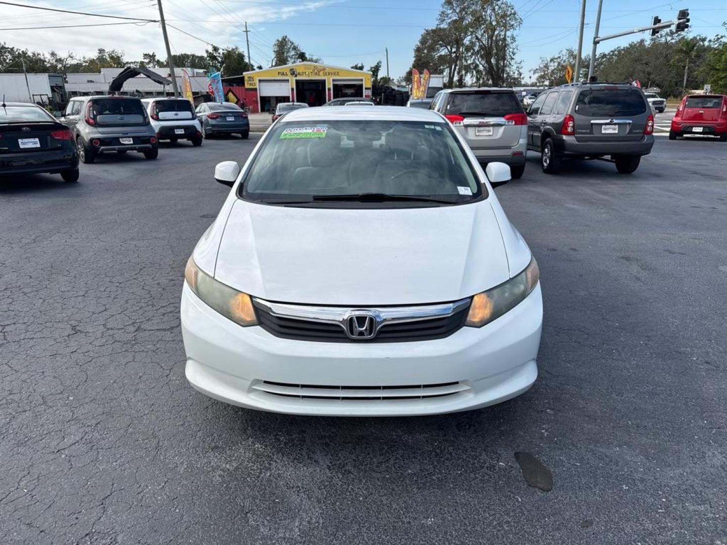 2012 WHITE HONDA CIVIC LX (19XFB2F58CE) with an 1.8L engine, Automatic transmission, located at 2929 9th St. West, Bradenton, 34205, (941) 242-2810, 27.473591, -82.570679 - Thanks for inquring into DriveNation USA! All vehicles listed can be viewed at www.drivenationusa.com for vehicle history reports and additonal info. We cannot quote any terms such as down payments or monthly payments without an application. You can apply directly at www.drivenationusa.com or by con - Photo#2