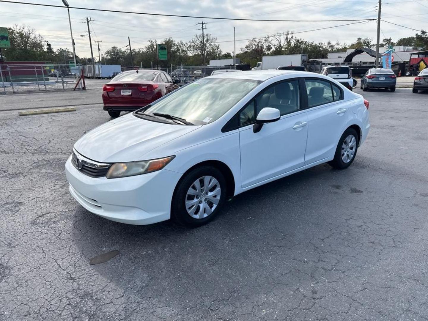 2012 WHITE HONDA CIVIC LX (19XFB2F58CE) with an 1.8L engine, Automatic transmission, located at 2929 9th St. West, Bradenton, 34205, (941) 242-2810, 27.473591, -82.570679 - Thanks for inquring into DriveNation USA! All vehicles listed can be viewed at www.drivenationusa.com for vehicle history reports and additonal info. We cannot quote any terms such as down payments or monthly payments without an application. You can apply directly at www.drivenationusa.com or by con - Photo#3