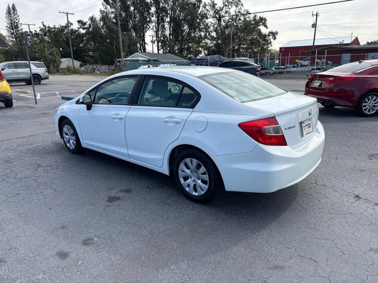 2012 WHITE HONDA CIVIC LX (19XFB2F58CE) with an 1.8L engine, Automatic transmission, located at 2929 9th St. West, Bradenton, 34205, (941) 242-2810, 27.473591, -82.570679 - Thanks for inquring into DriveNation USA! All vehicles listed can be viewed at www.drivenationusa.com for vehicle history reports and additonal info. We cannot quote any terms such as down payments or monthly payments without an application. You can apply directly at www.drivenationusa.com or by con - Photo#5