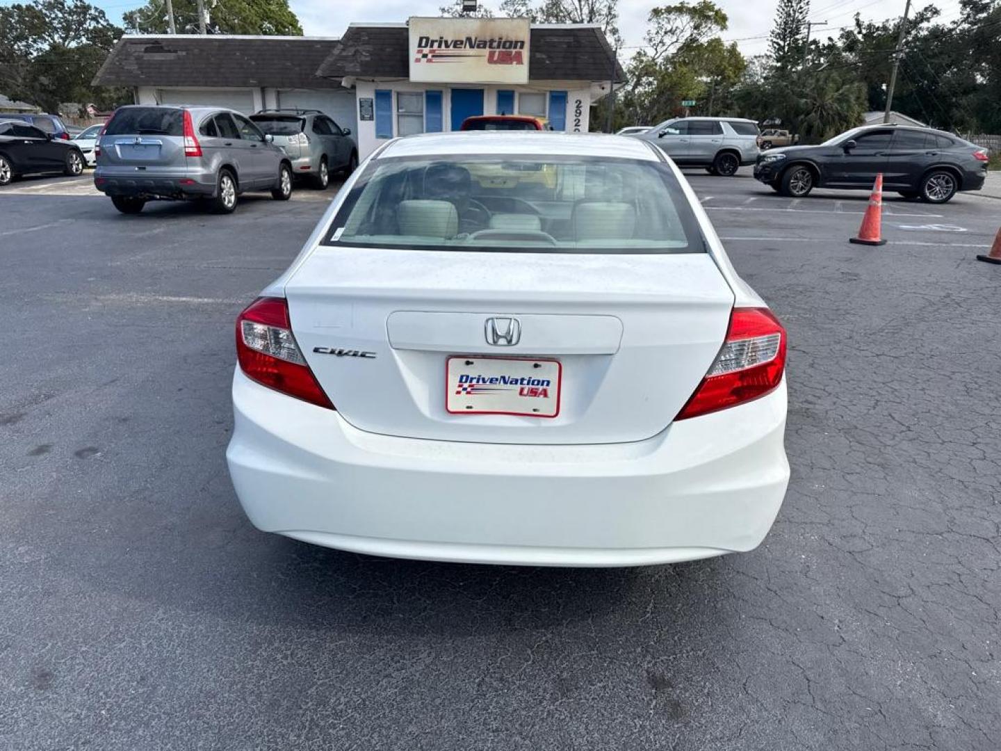 2012 WHITE HONDA CIVIC LX (19XFB2F58CE) with an 1.8L engine, Automatic transmission, located at 2929 9th St. West, Bradenton, 34205, (941) 242-2810, 27.473591, -82.570679 - Thanks for inquring into DriveNation USA! All vehicles listed can be viewed at www.drivenationusa.com for vehicle history reports and additonal info. We cannot quote any terms such as down payments or monthly payments without an application. You can apply directly at www.drivenationusa.com or by con - Photo#6