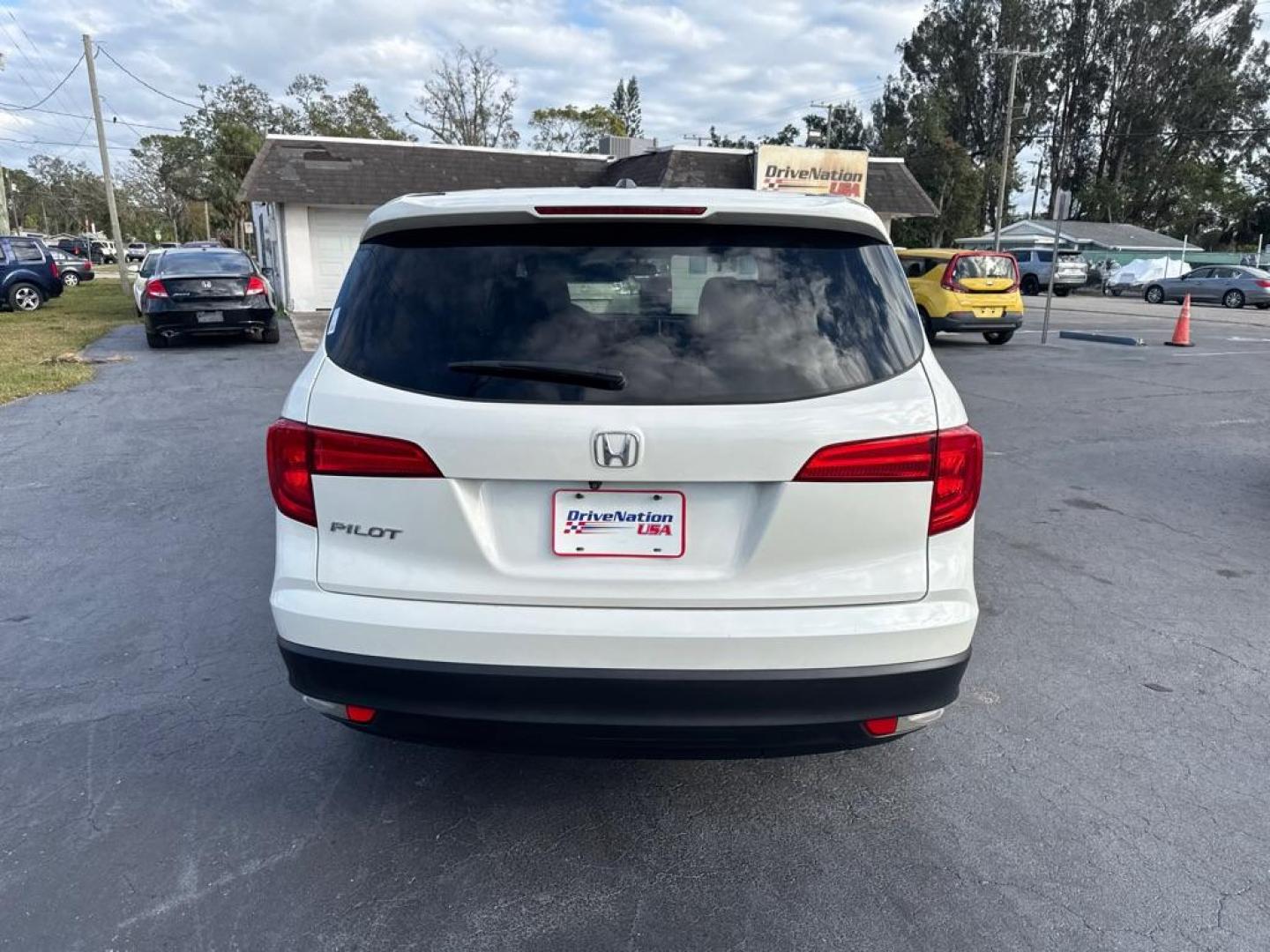 2017 WHITE HONDA PILOT EX (5FNYF5H31HB) with an 3.5L engine, Automatic transmission, located at 2929 9th St. West, Bradenton, 34205, (941) 242-2810, 27.473591, -82.570679 - Thanks for inquring into DriveNation USA! All vehicles listed can be viewed at www.drivenationusa.com for vehicle history reports and additonal info. We cannot quote any terms such as down payments or monthly payments without an application. You can apply directly at www.drivenationusa.com or by con - Photo#6