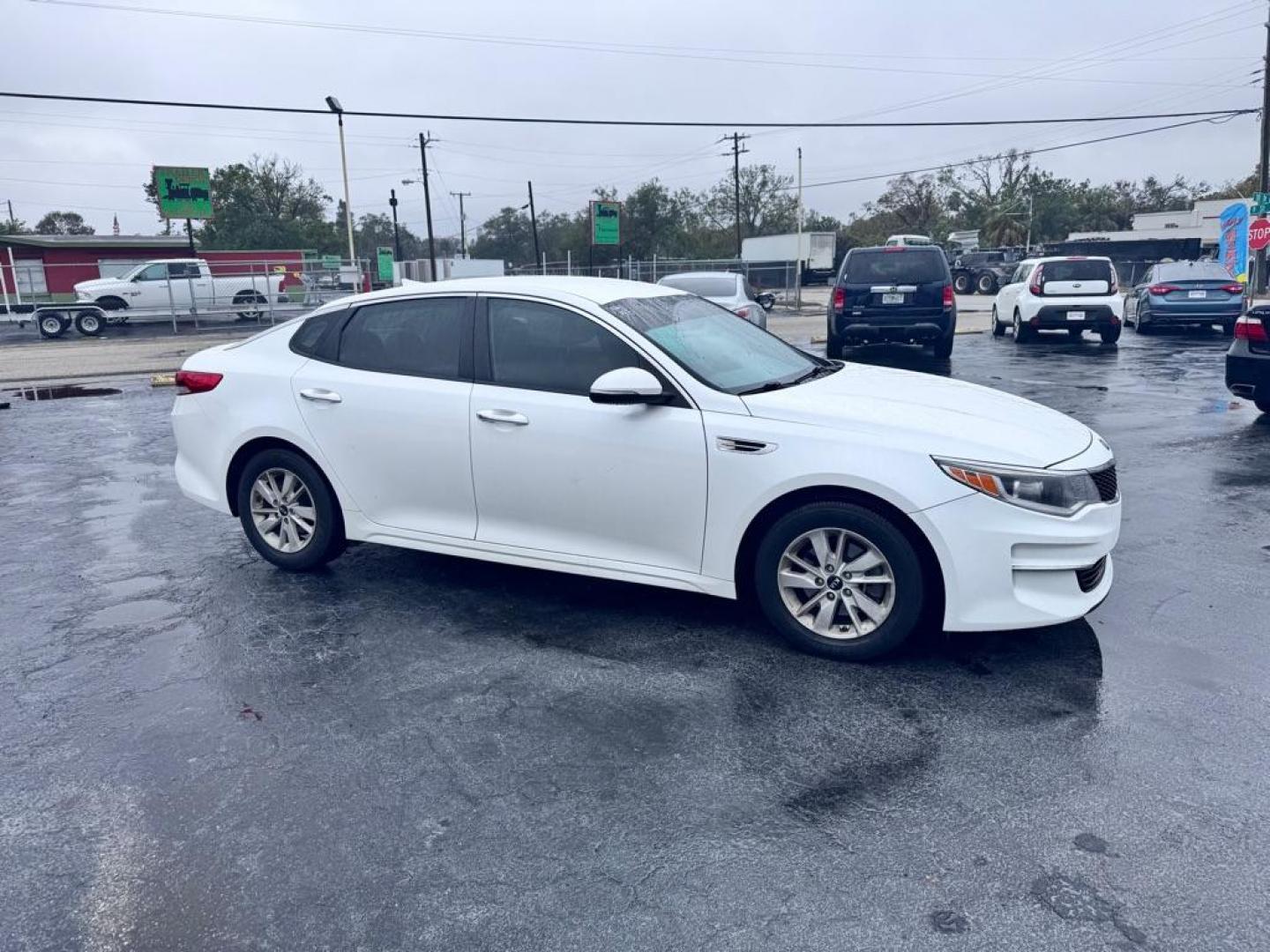 2016 WHITE KIA OPTIMA LX (KNAGT4L30G5) with an 2.4L engine, Automatic transmission, located at 2929 9th St. West, Bradenton, 34205, (941) 242-2810, 27.473591, -82.570679 - Thanks for inquring into DriveNation USA! All vehicles listed can be viewed at www.drivenationusa.com for vehicle history reports and additonal info. We cannot quote any terms such as down payments or monthly payments without an application. You can apply directly at www.drivenationusa.com or by con - Photo#1