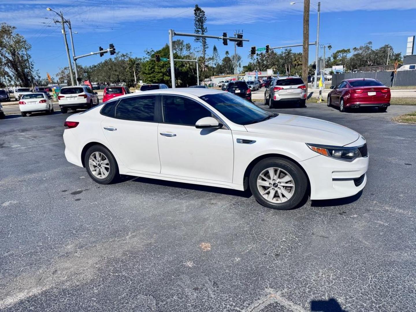 2016 WHITE KIA OPTIMA LX (KNAGT4L30G5) with an 2.4L engine, Automatic transmission, located at 2929 9th St. West, Bradenton, 34205, (941) 242-2810, 27.473591, -82.570679 - Thanks for inquring into DriveNation USA! All vehicles listed can be viewed at www.drivenationusa.com for vehicle history reports and additonal info. We cannot quote any terms such as down payments or monthly payments without an application. You can apply directly at www.drivenationusa.com or by con - Photo#0