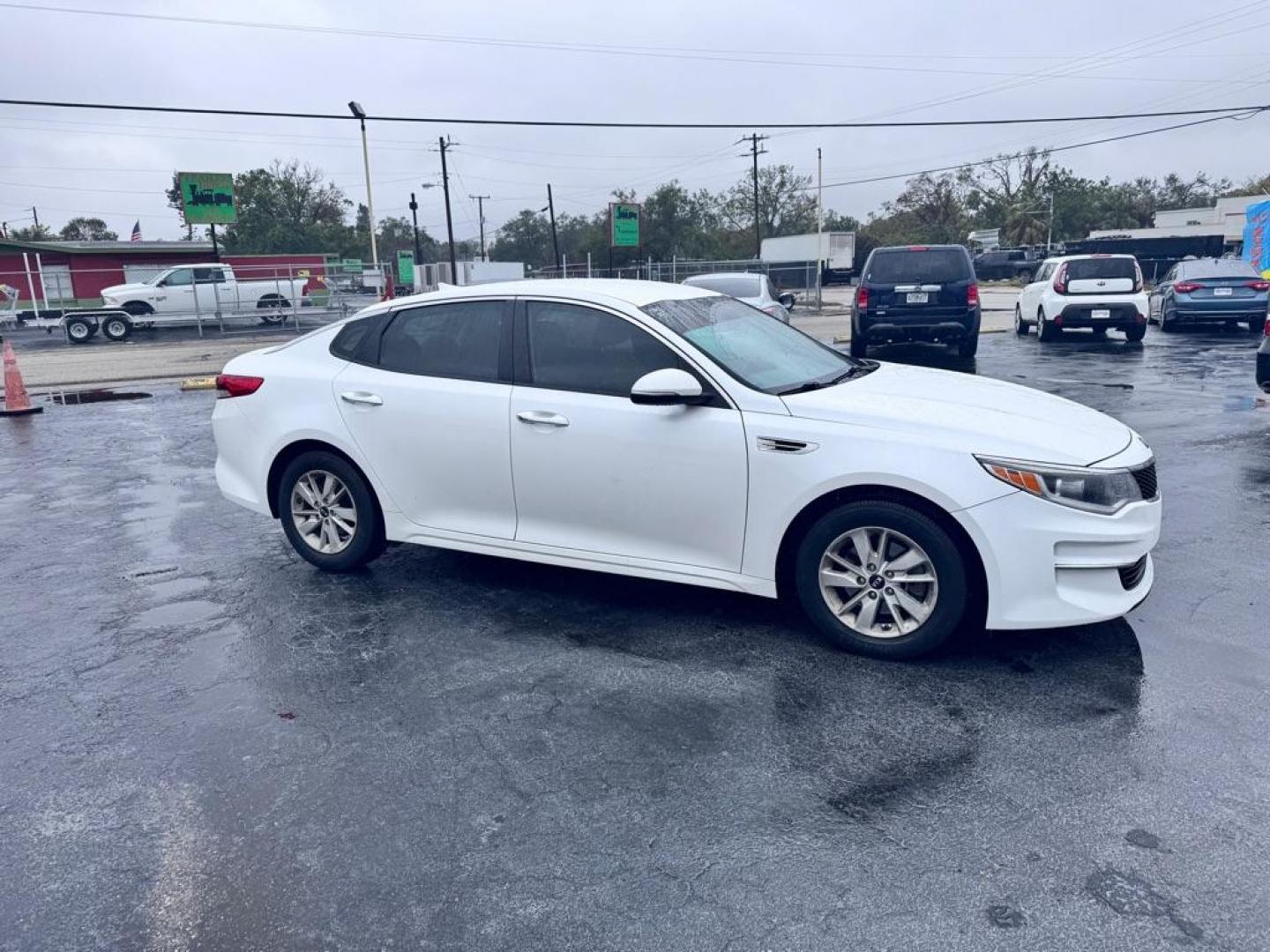 2016 WHITE KIA OPTIMA LX (KNAGT4L30G5) with an 2.4L engine, Automatic transmission, located at 2929 9th St. West, Bradenton, 34205, (941) 242-2810, 27.473591, -82.570679 - Thanks for inquring into DriveNation USA! All vehicles listed can be viewed at www.drivenationusa.com for vehicle history reports and additonal info. We cannot quote any terms such as down payments or monthly payments without an application. You can apply directly at www.drivenationusa.com or by con - Photo#2