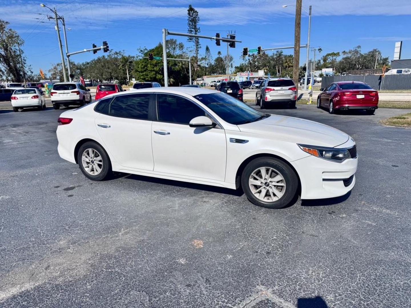 2016 WHITE KIA OPTIMA LX (KNAGT4L30G5) with an 2.4L engine, Automatic transmission, located at 2929 9th St. West, Bradenton, 34205, (941) 242-2810, 27.473591, -82.570679 - Thanks for inquring into DriveNation USA! All vehicles listed can be viewed at www.drivenationusa.com for vehicle history reports and additonal info. We cannot quote any terms such as down payments or monthly payments without an application. You can apply directly at www.drivenationusa.com or by con - Photo#13