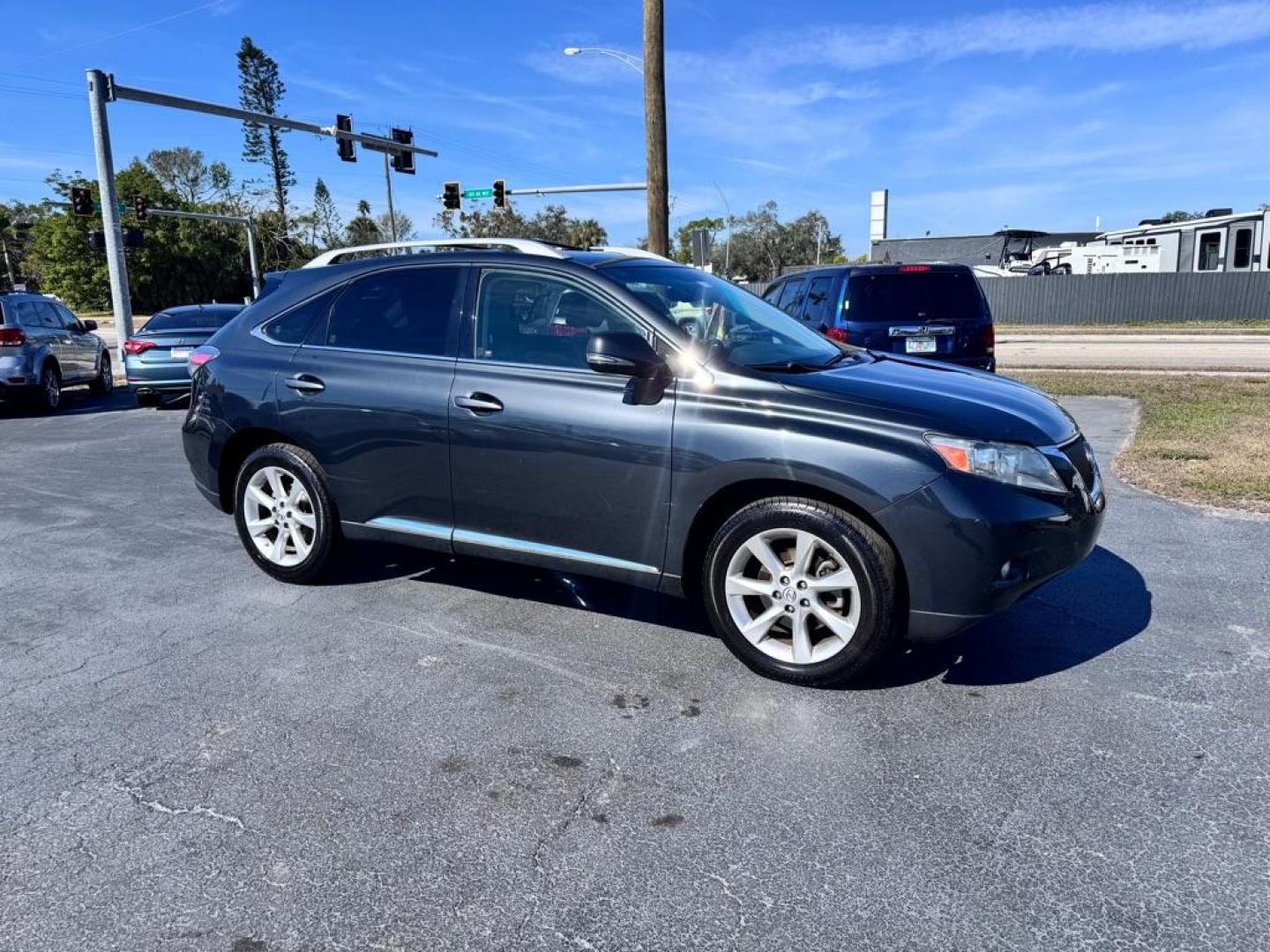 2010 BLACK LEXUS RX 350 (JTJZK1BAXA2) with an 3.5L engine, Automatic transmission, located at 2929 9th St. West, Bradenton, 34205, (941) 242-2810, 27.473591, -82.570679 - Photo#1