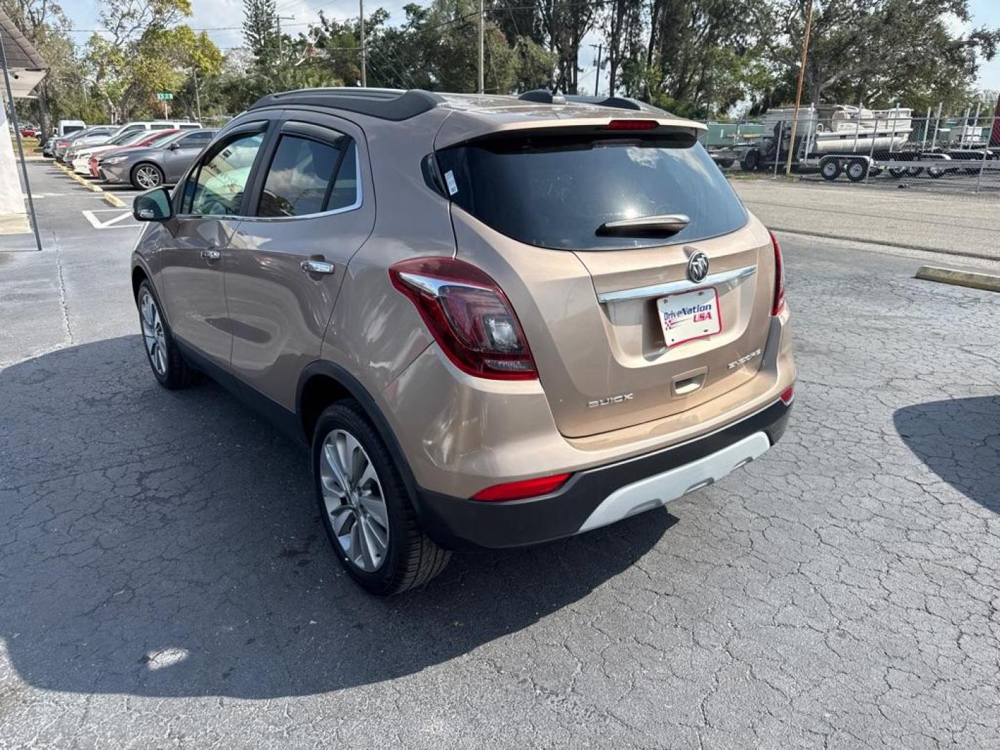 2018 TAN BUICK ENCORE PREFERRED (KL4CJASB5JB) with an 1.4L engine, Automatic transmission, located at 2929 9th St. West, Bradenton, 34205, (941) 242-2810, 27.473591, -82.570679 - Thanks for inquring into DriveNation USA! All vehicles listed can be viewed at www.drivenationusa.com for vehicle history reports and additonal info. We cannot quote any terms such as down payments or monthly payments without an application. You can apply directly at www.drivenationusa.com or by con - Photo#5