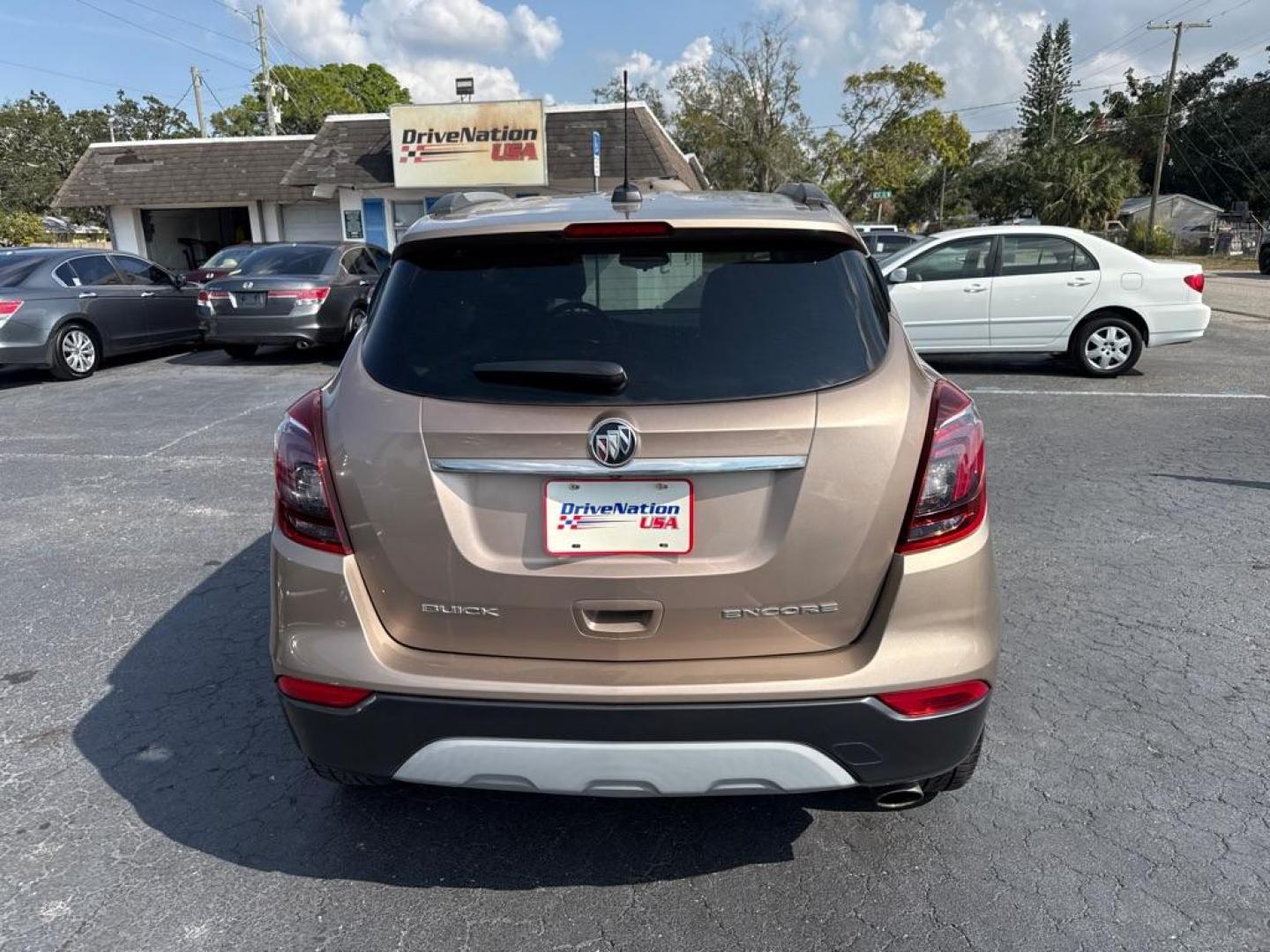 2018 TAN BUICK ENCORE PREFERRED (KL4CJASB5JB) with an 1.4L engine, Automatic transmission, located at 2929 9th St. West, Bradenton, 34205, (941) 242-2810, 27.473591, -82.570679 - Thanks for inquring into DriveNation USA! All vehicles listed can be viewed at www.drivenationusa.com for vehicle history reports and additonal info. We cannot quote any terms such as down payments or monthly payments without an application. You can apply directly at www.drivenationusa.com or by con - Photo#6