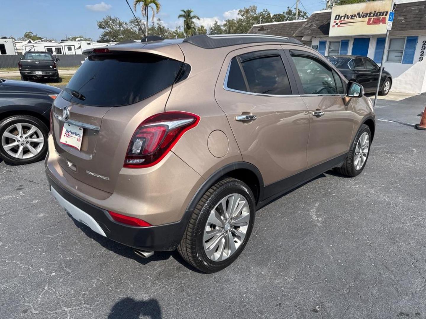 2018 TAN BUICK ENCORE PREFERRED (KL4CJASB5JB) with an 1.4L engine, Automatic transmission, located at 2929 9th St. West, Bradenton, 34205, (941) 242-2810, 27.473591, -82.570679 - Thanks for inquring into DriveNation USA! All vehicles listed can be viewed at www.drivenationusa.com for vehicle history reports and additonal info. We cannot quote any terms such as down payments or monthly payments without an application. You can apply directly at www.drivenationusa.com or by con - Photo#7