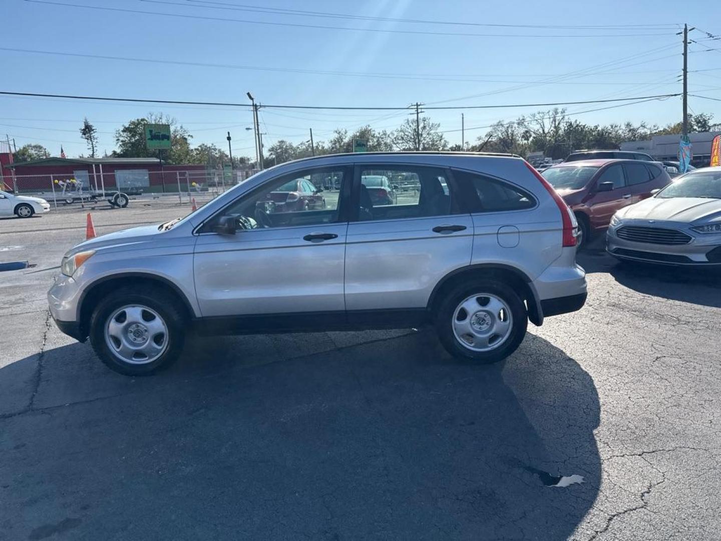 2010 SILVER HONDA CR-V LX (3CZRE3H35AG) with an 2.4L engine, Automatic transmission, located at 2929 9th St. West, Bradenton, 34205, (941) 242-2810, 27.473591, -82.570679 - Photo#4