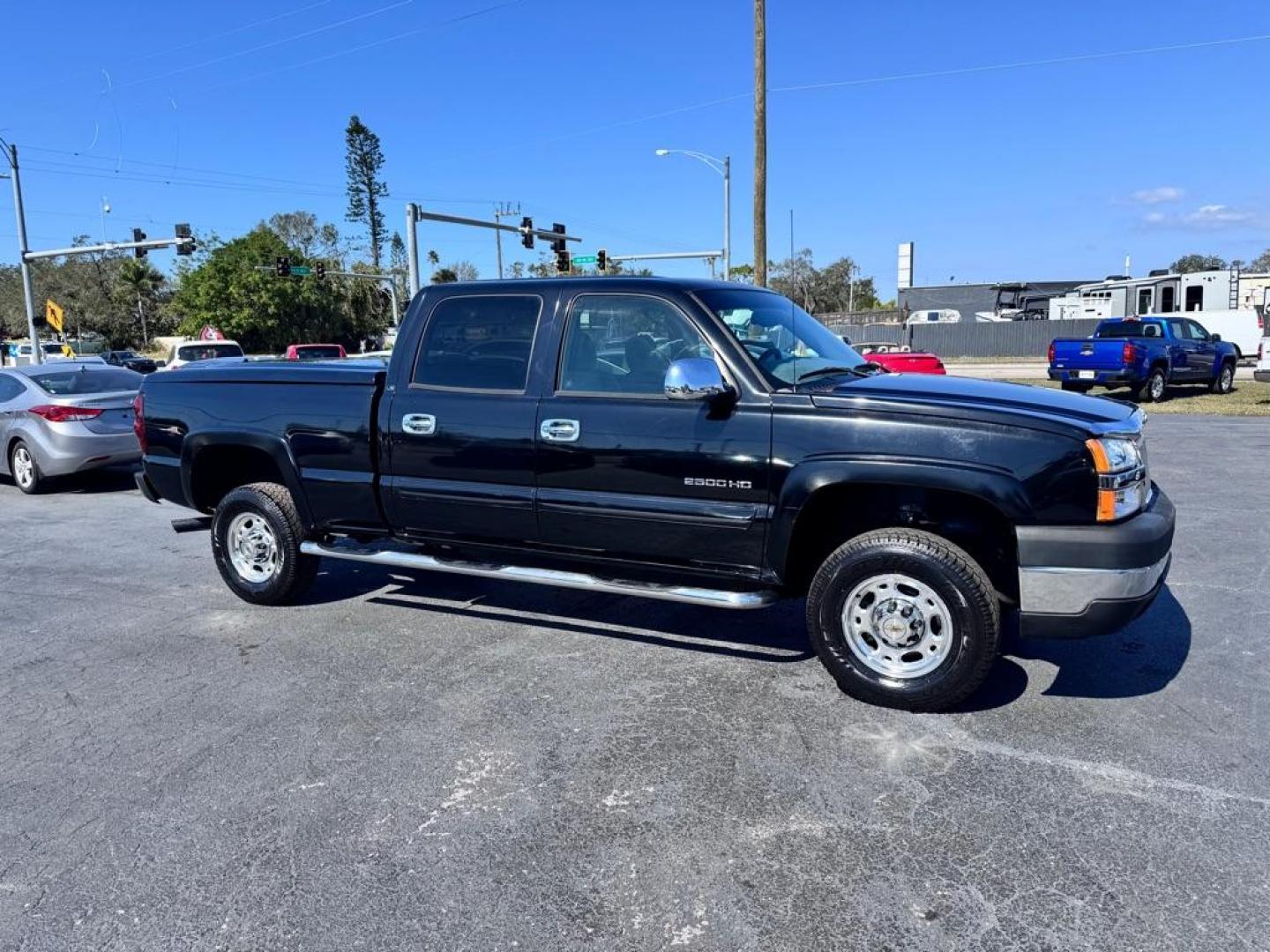 2004 BLACK CHEVROLET SILVERADO 2500 HEAVY DUTY (1GCHC23U04F) with an 6.0L engine, Automatic transmission, located at 2929 9th St. West, Bradenton, 34205, (941) 242-2810, 27.473591, -82.570679 - Thanks for inquring into DriveNation USA! All vehicles listed can be viewed at www.drivenationusa.com for vehicle history reports and additonal info. We cannot quote any terms such as down payments or monthly payments without an application. You can apply directly at www.drivenationusa.com or by con - Photo#0