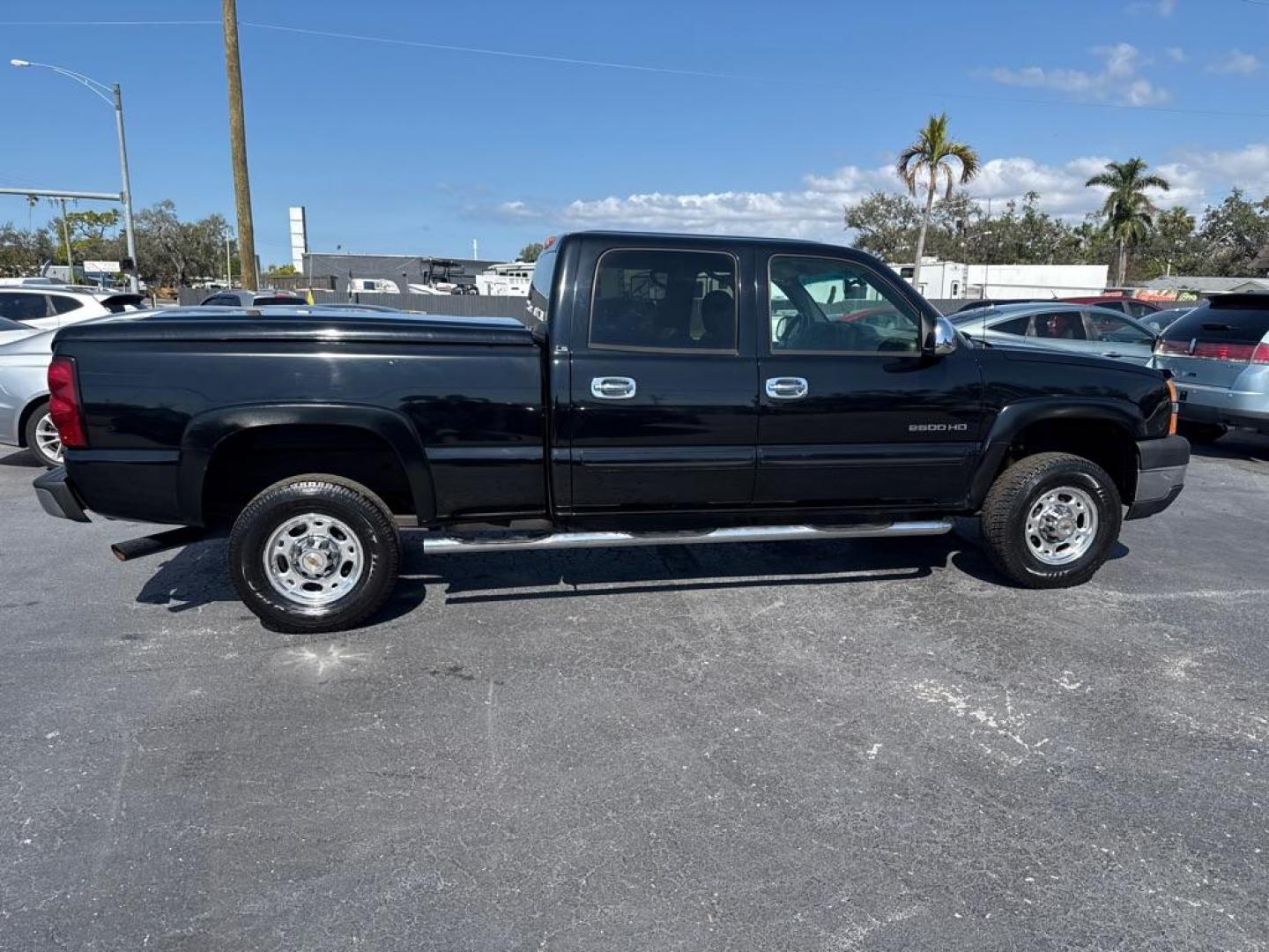 2004 BLACK CHEVROLET SILVERADO 2500 HEAVY DUTY (1GCHC23U04F) with an 6.0L engine, Automatic transmission, located at 2929 9th St. West, Bradenton, 34205, (941) 242-2810, 27.473591, -82.570679 - Thanks for inquring into DriveNation USA! All vehicles listed can be viewed at www.drivenationusa.com for vehicle history reports and additonal info. We cannot quote any terms such as down payments or monthly payments without an application. You can apply directly at www.drivenationusa.com or by con - Photo#9