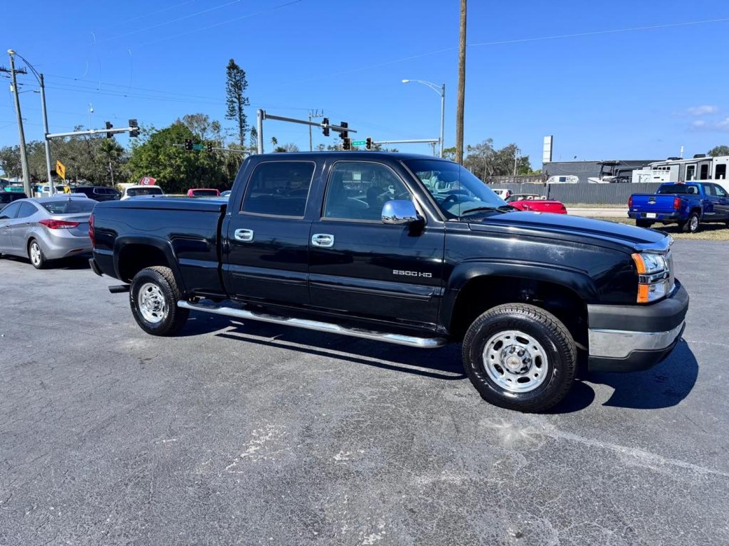 2004 BLACK CHEVROLET SILVERADO 2500 HEAVY DUTY (1GCHC23U04F) with an 6.0L engine, Automatic transmission, located at 2929 9th St. West, Bradenton, 34205, (941) 242-2810, 27.473591, -82.570679 - Thanks for inquring into DriveNation USA! All vehicles listed can be viewed at www.drivenationusa.com for vehicle history reports and additonal info. We cannot quote any terms such as down payments or monthly payments without an application. You can apply directly at www.drivenationusa.com or by con - Photo#1