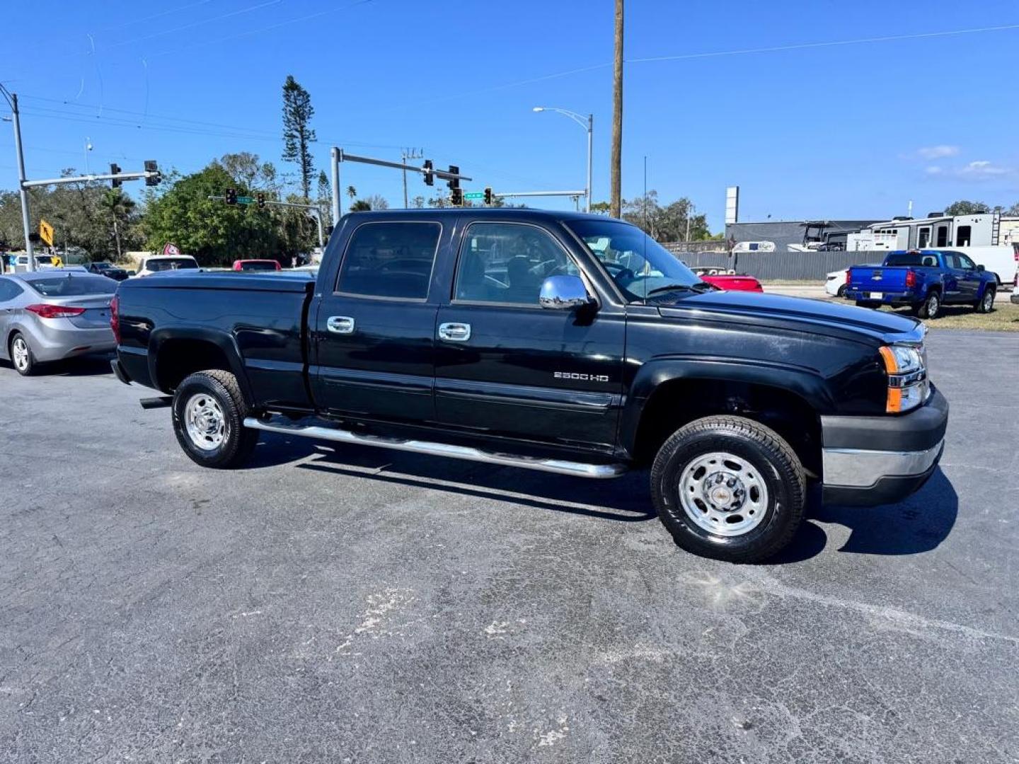 2004 BLACK CHEVROLET SILVERADO 2500 HEAVY DUTY (1GCHC23U04F) with an 6.0L engine, Automatic transmission, located at 2929 9th St. West, Bradenton, 34205, (941) 242-2810, 27.473591, -82.570679 - Thanks for inquring into DriveNation USA! All vehicles listed can be viewed at www.drivenationusa.com for vehicle history reports and additonal info. We cannot quote any terms such as down payments or monthly payments without an application. You can apply directly at www.drivenationusa.com or by con - Photo#2