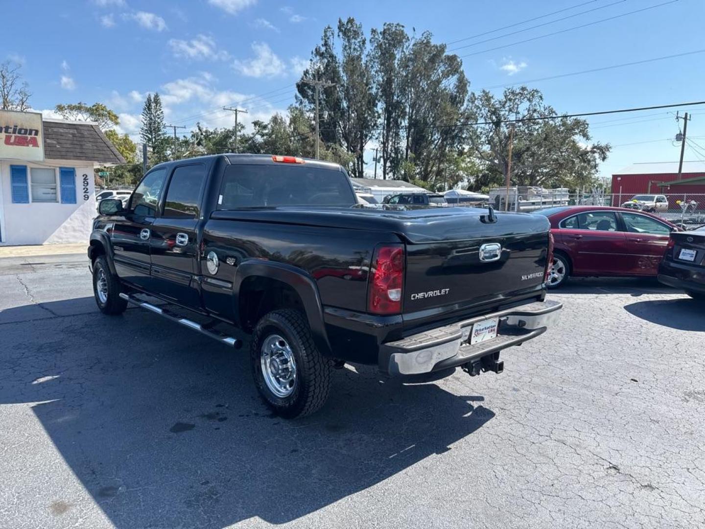 2004 BLACK CHEVROLET SILVERADO 2500 HEAVY DUTY (1GCHC23U04F) with an 6.0L engine, Automatic transmission, located at 2929 9th St. West, Bradenton, 34205, (941) 242-2810, 27.473591, -82.570679 - Thanks for inquring into DriveNation USA! All vehicles listed can be viewed at www.drivenationusa.com for vehicle history reports and additonal info. We cannot quote any terms such as down payments or monthly payments without an application. You can apply directly at www.drivenationusa.com or by con - Photo#6