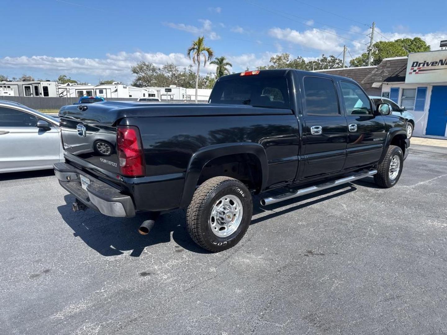 2004 BLACK CHEVROLET SILVERADO 2500 HEAVY DUTY (1GCHC23U04F) with an 6.0L engine, Automatic transmission, located at 2929 9th St. West, Bradenton, 34205, (941) 242-2810, 27.473591, -82.570679 - Thanks for inquring into DriveNation USA! All vehicles listed can be viewed at www.drivenationusa.com for vehicle history reports and additonal info. We cannot quote any terms such as down payments or monthly payments without an application. You can apply directly at www.drivenationusa.com or by con - Photo#8