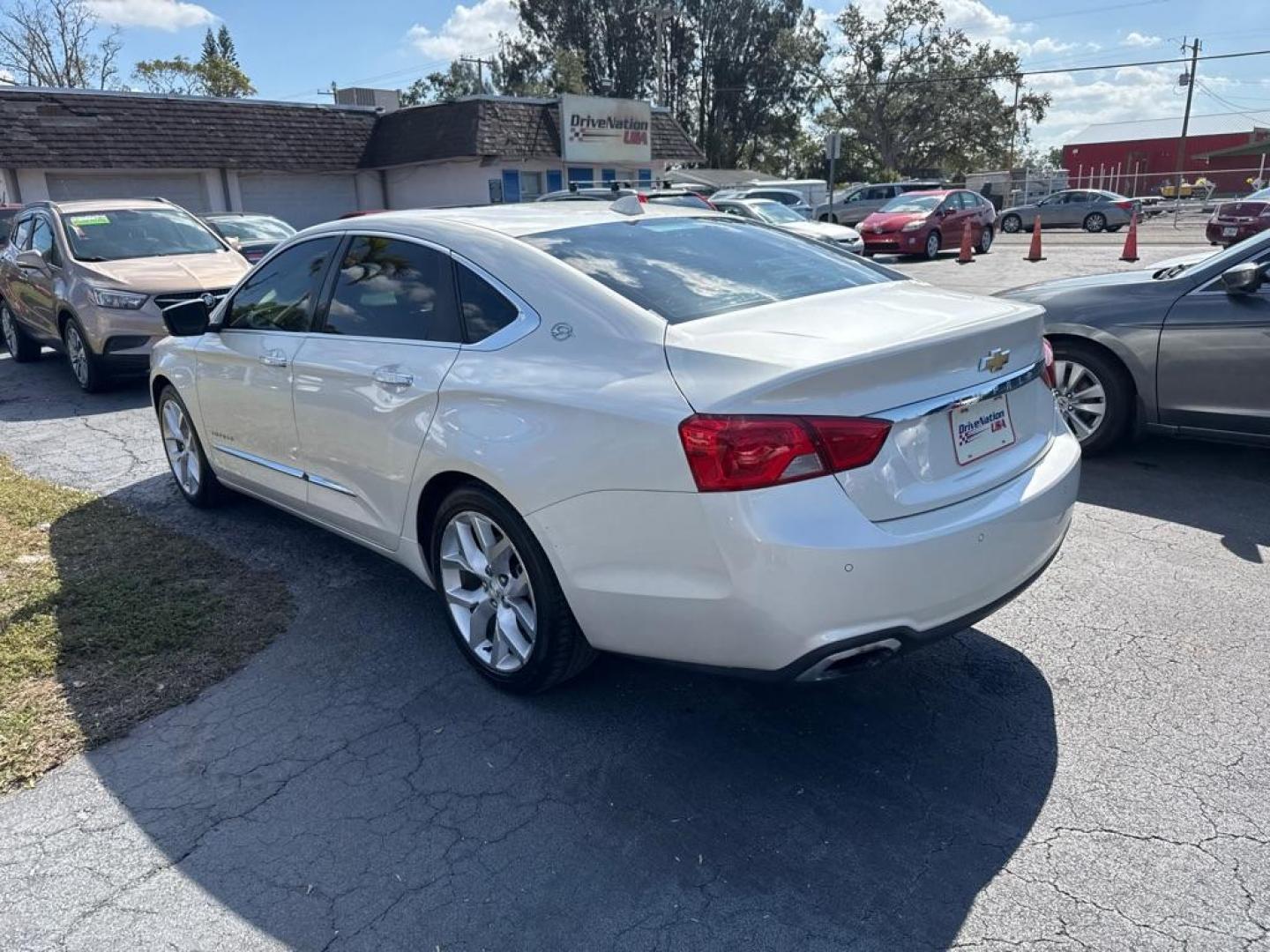 2014 WHITE CHEVROLET IMPALA LTZ (1G1155S36EU) with an 3.6L engine, Automatic transmission, located at 2929 9th St. West, Bradenton, 34205, (941) 242-2810, 27.473591, -82.570679 - Thanks for inquring into DriveNation USA! All vehicles listed can be viewed at www.drivenationusa.com for vehicle history reports and additonal info. We cannot quote any terms such as down payments or monthly payments without an application. You can apply directly at www.drivenationusa.com or by con - Photo#5