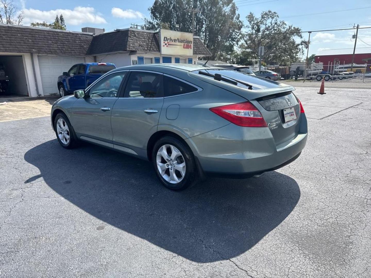 2010 GREEN HONDA ACCORD CROSSTOU EXL (5J6TF1H56AL) with an 3.5L engine, Automatic transmission, located at 2929 9th St. West, Bradenton, 34205, (941) 242-2810, 27.473591, -82.570679 - Thanks for inquring into DriveNation USA! All vehicles listed can be viewed at www.drivenationusa.com for vehicle history reports and additonal info. We cannot quote any terms such as down payments or monthly payments without an application. You can apply directly at www.drivenationusa.com or by con - Photo#5