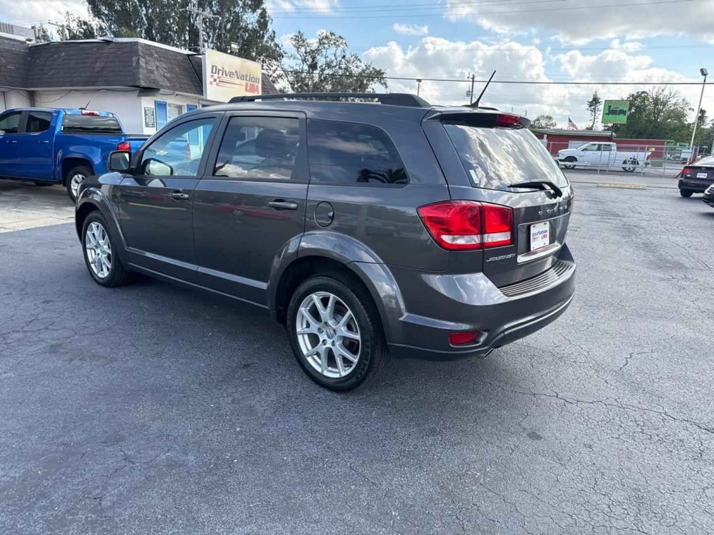 2016 GRAY DODGE JOURNEY SXT (3C4PDCBG1GT) with an 3.6L engine, Automatic transmission, located at 2929 9th St. West, Bradenton, 34205, (941) 242-2810, 27.473591, -82.570679 - Thanks for inquring into DriveNation USA! All vehicles listed can be viewed at www.drivenationusa.com for vehicle history reports and additonal info. We cannot quote any terms such as down payments or monthly payments without an application. You can apply directly at www.drivenationusa.com or by con - Photo#5