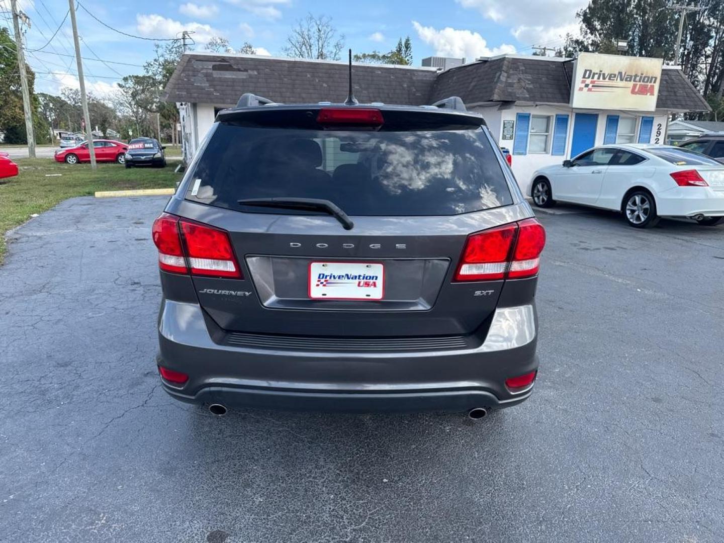 2016 GRAY DODGE JOURNEY SXT (3C4PDCBG1GT) with an 3.6L engine, Automatic transmission, located at 2929 9th St. West, Bradenton, 34205, (941) 242-2810, 27.473591, -82.570679 - Thanks for inquring into DriveNation USA! All vehicles listed can be viewed at www.drivenationusa.com for vehicle history reports and additonal info. We cannot quote any terms such as down payments or monthly payments without an application. You can apply directly at www.drivenationusa.com or by con - Photo#6